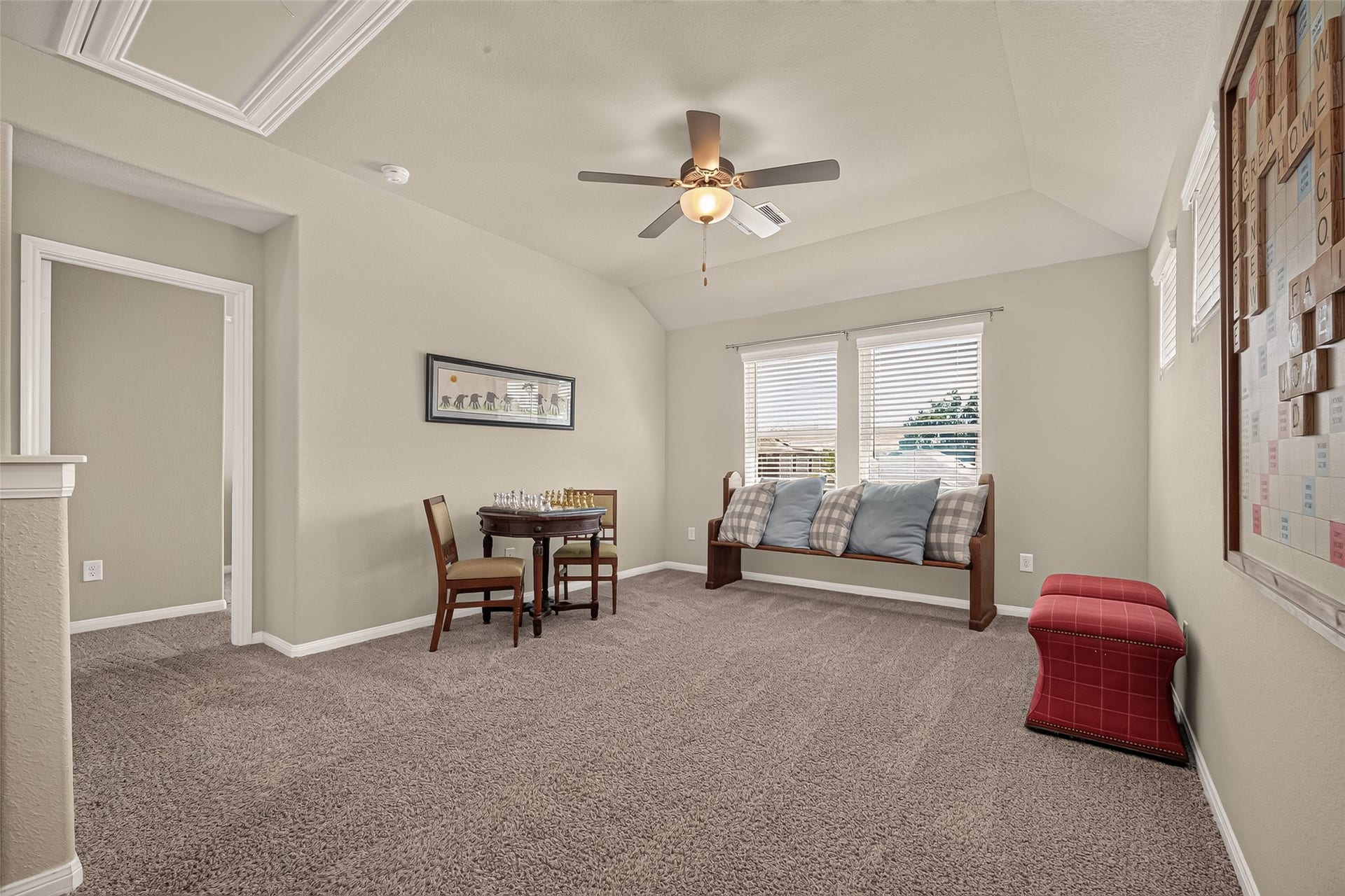 2321 W Winding Pines Drive, Tomball, TX 77375 Then the upstairs opens to a large game room with several windows to let in the natural light.