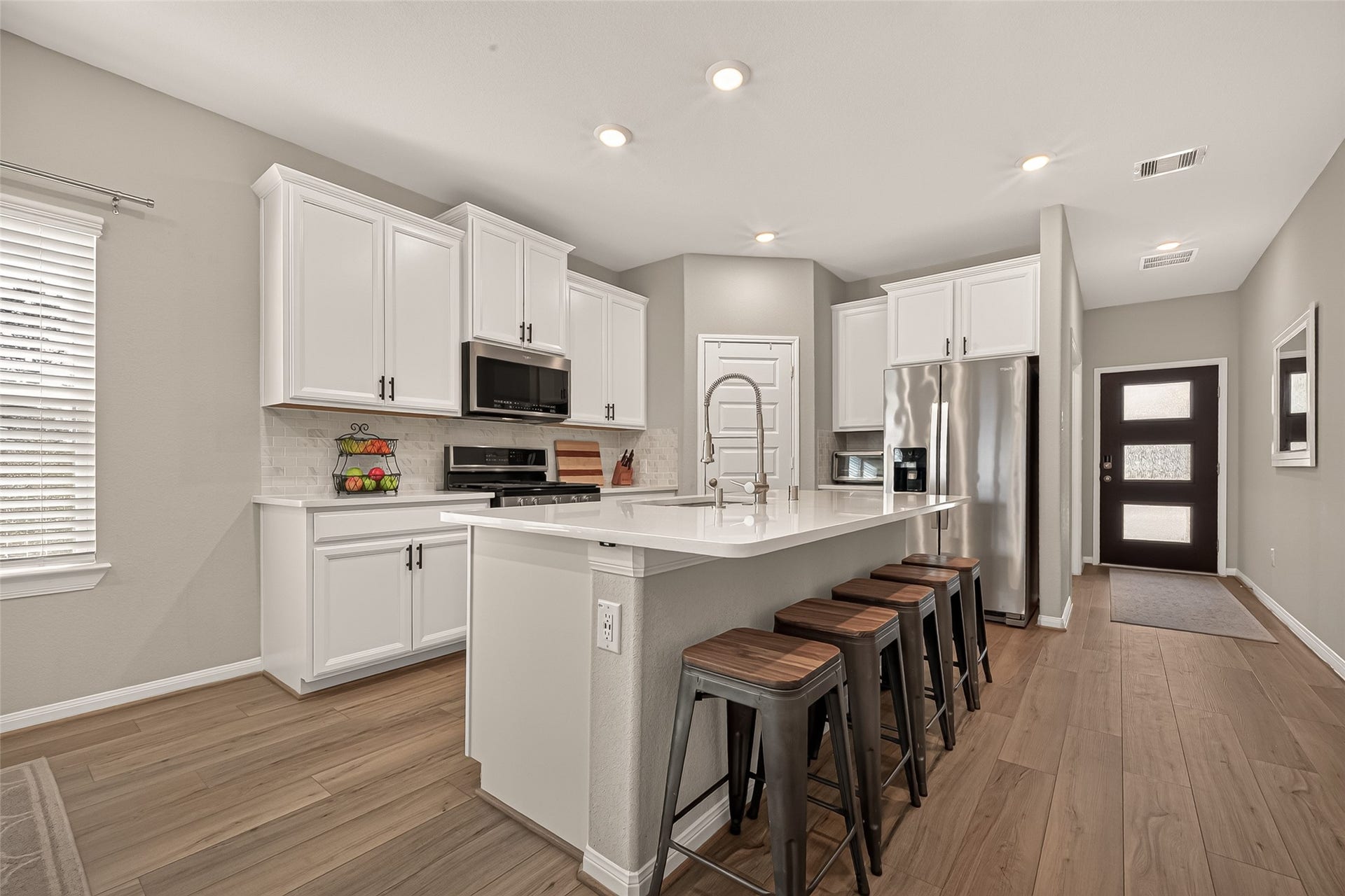2321 W Winding Pines Drive, Tomball, TX 77375 Plenty of space for food prep and entertaining on this large kitchen island.
