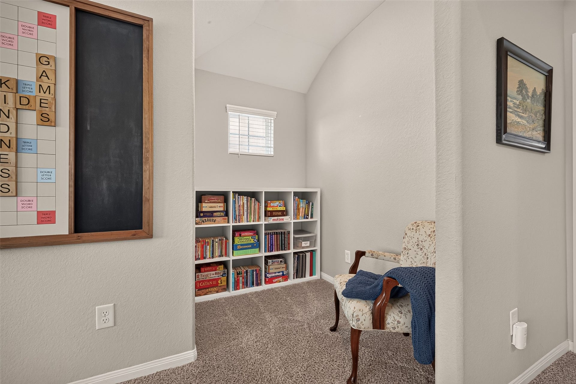 2321 W Winding Pines Drive, Tomball, TX 77375 As you come upstairs, you'll first see the reading nook area of the game room.