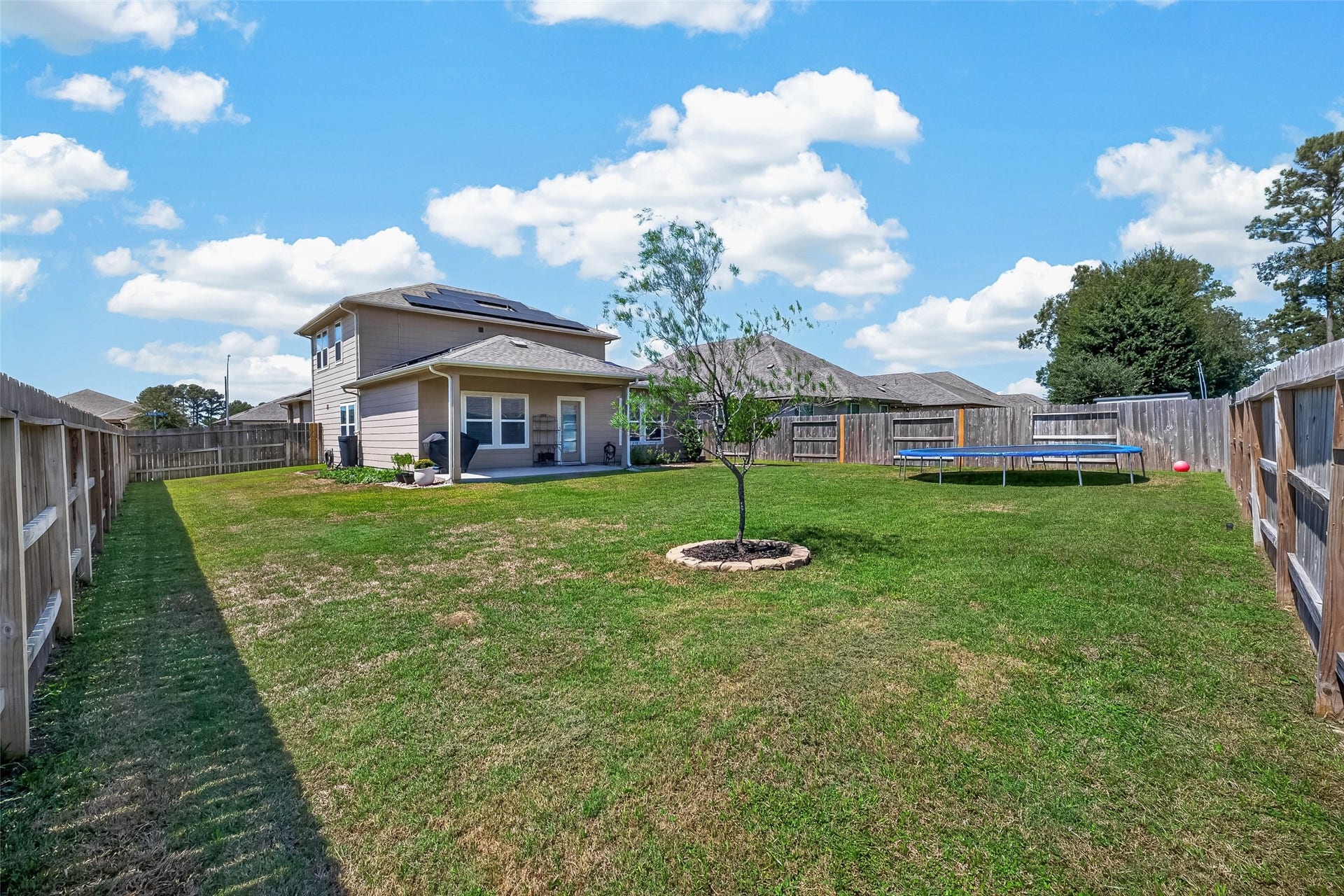 2321 W Winding Pines Drive, Tomball, TX 77375 Enjoy the large back and side yard that is fully fenced and landscaped.