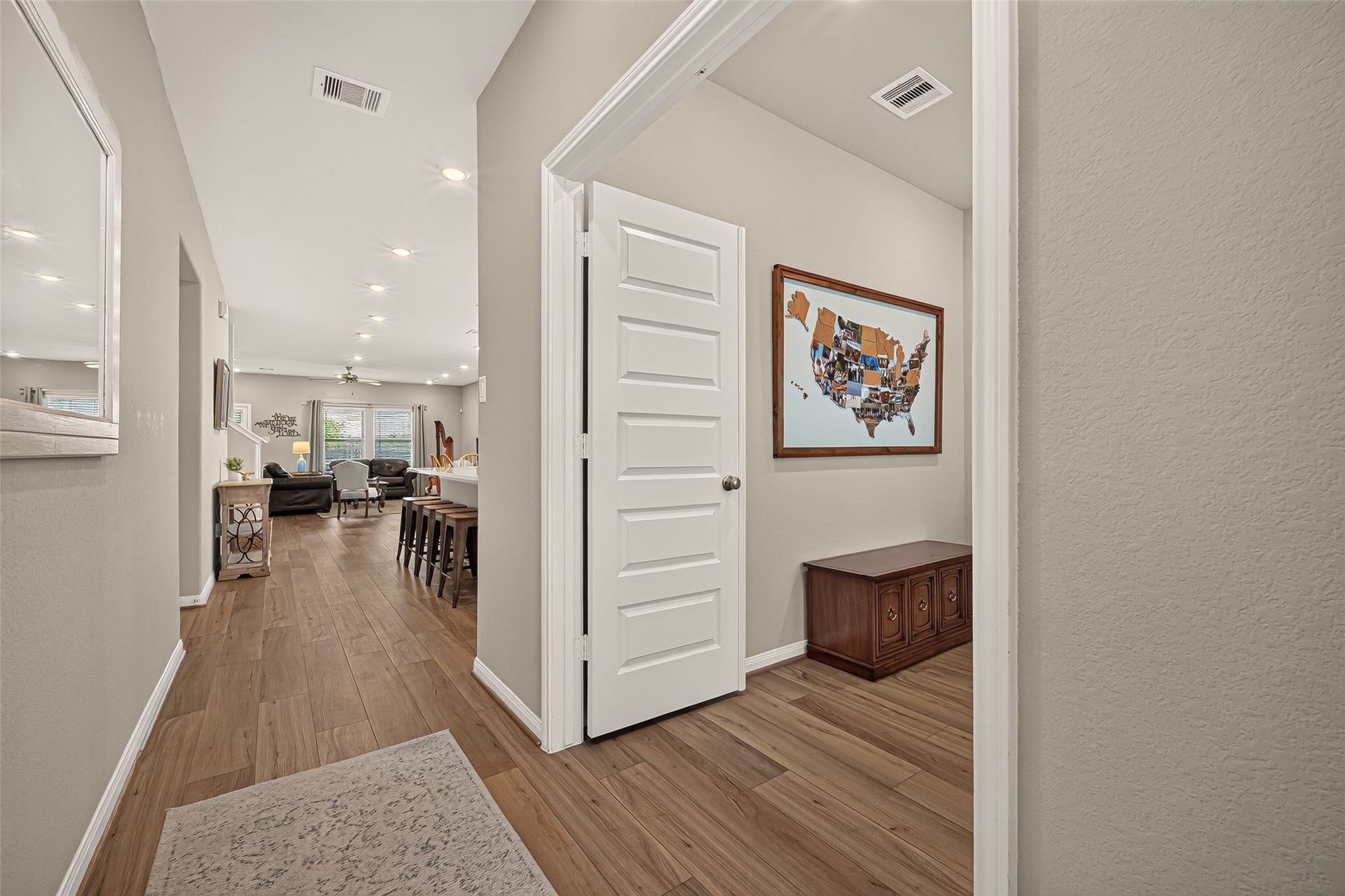 2321 W Winding Pines Drive, Tomball, TX 77375 Enter the home to see the thoughtful layout.