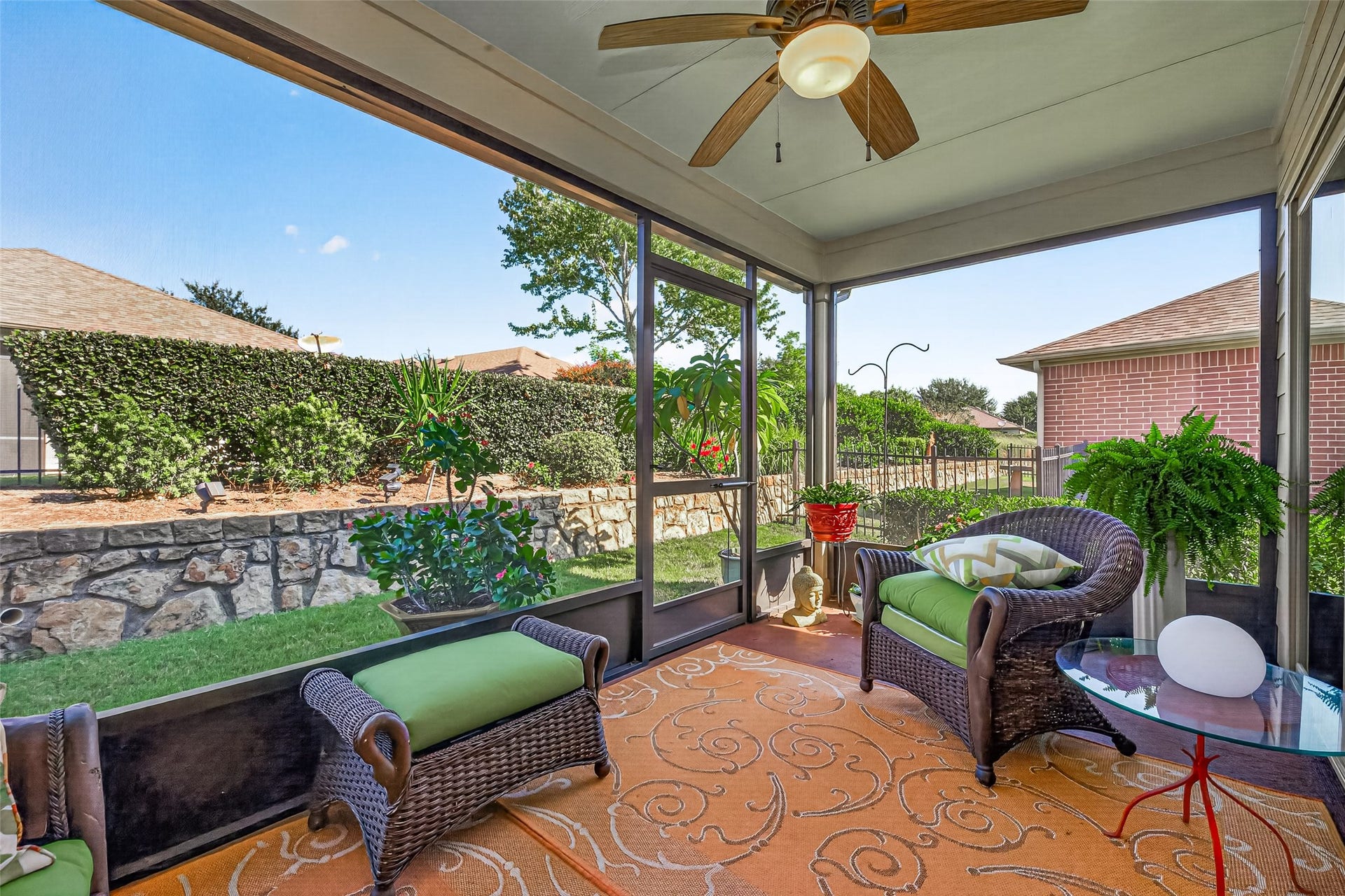 1126 Oleander Way, Richmond, TX 77469 Enjoy morning coffee on the enclosed back porch overlooking the garden.