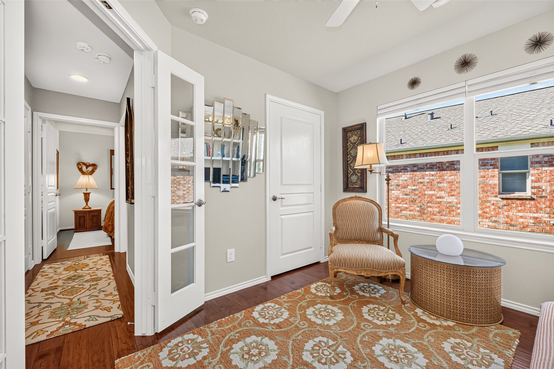 1126 Oleander Way, Richmond, TX 77469 Glass-pane French doors add charm and privacy to the office.