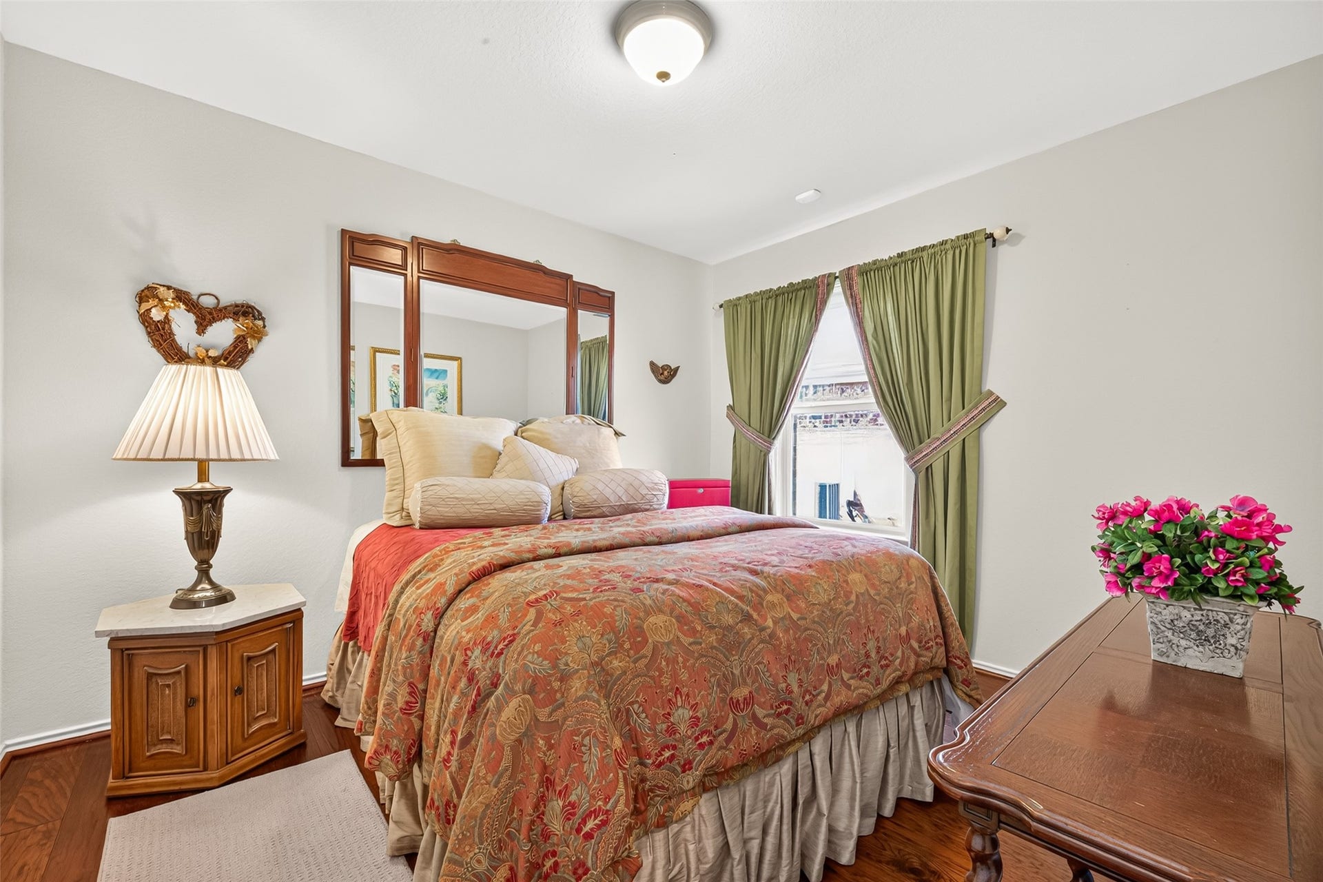 1126 Oleander Way, Richmond, TX 77469 A comfortable guest bedroom with natural light and room to settle in.