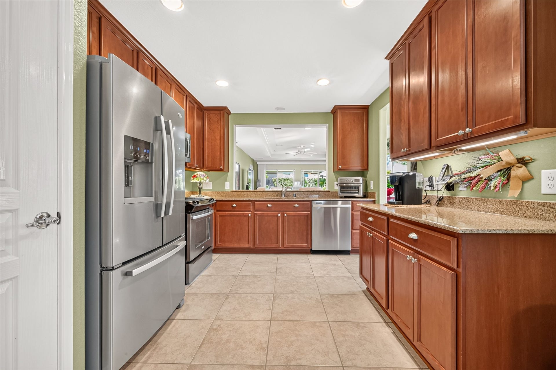 1126 Oleander Way, Richmond, TX 77469 A practical kitchen layout keeps everything within easy reach.