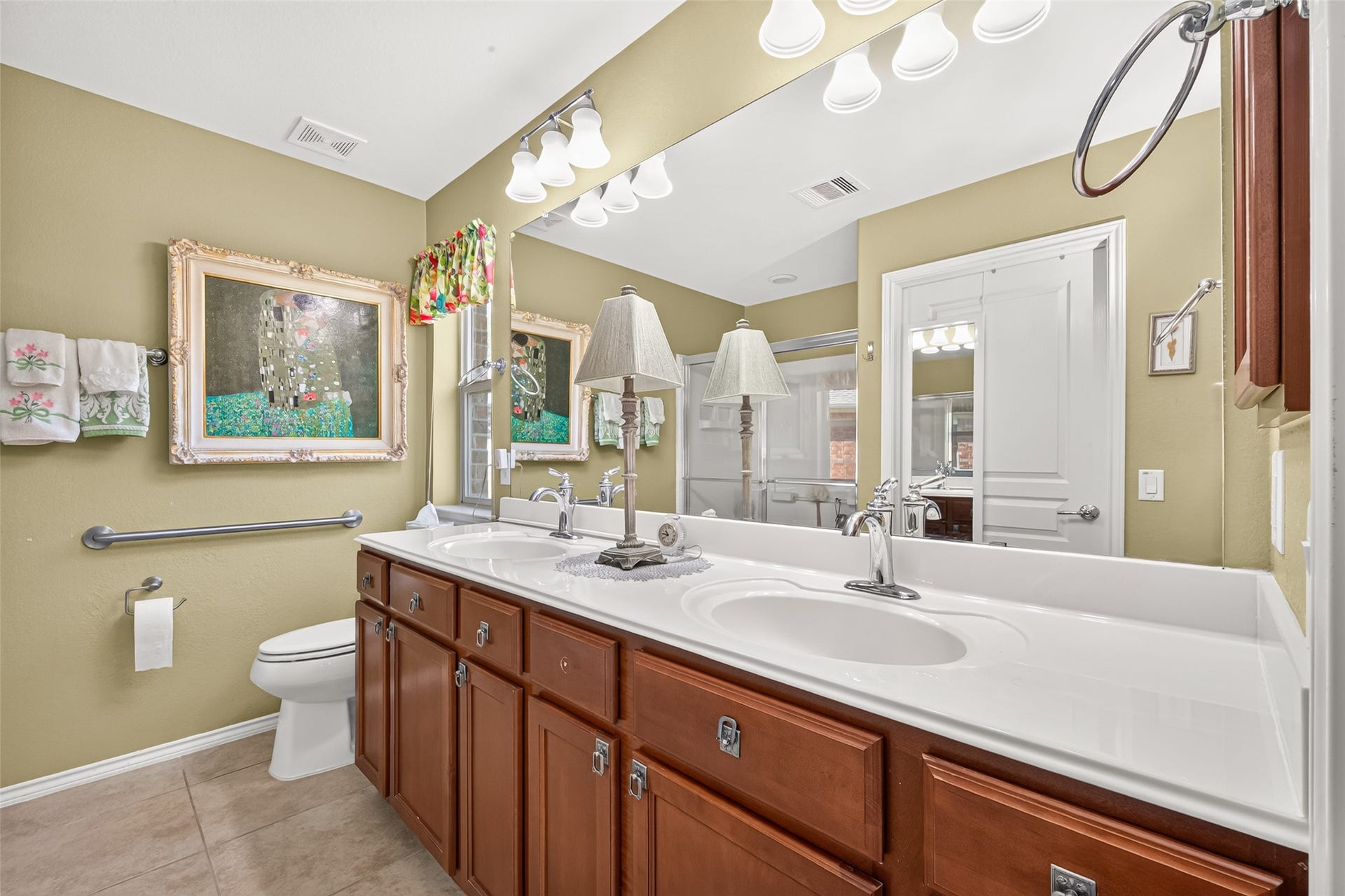 1126 Oleander Way, Richmond, TX 77469 Dual sinks and ample storage make daily routines easier.