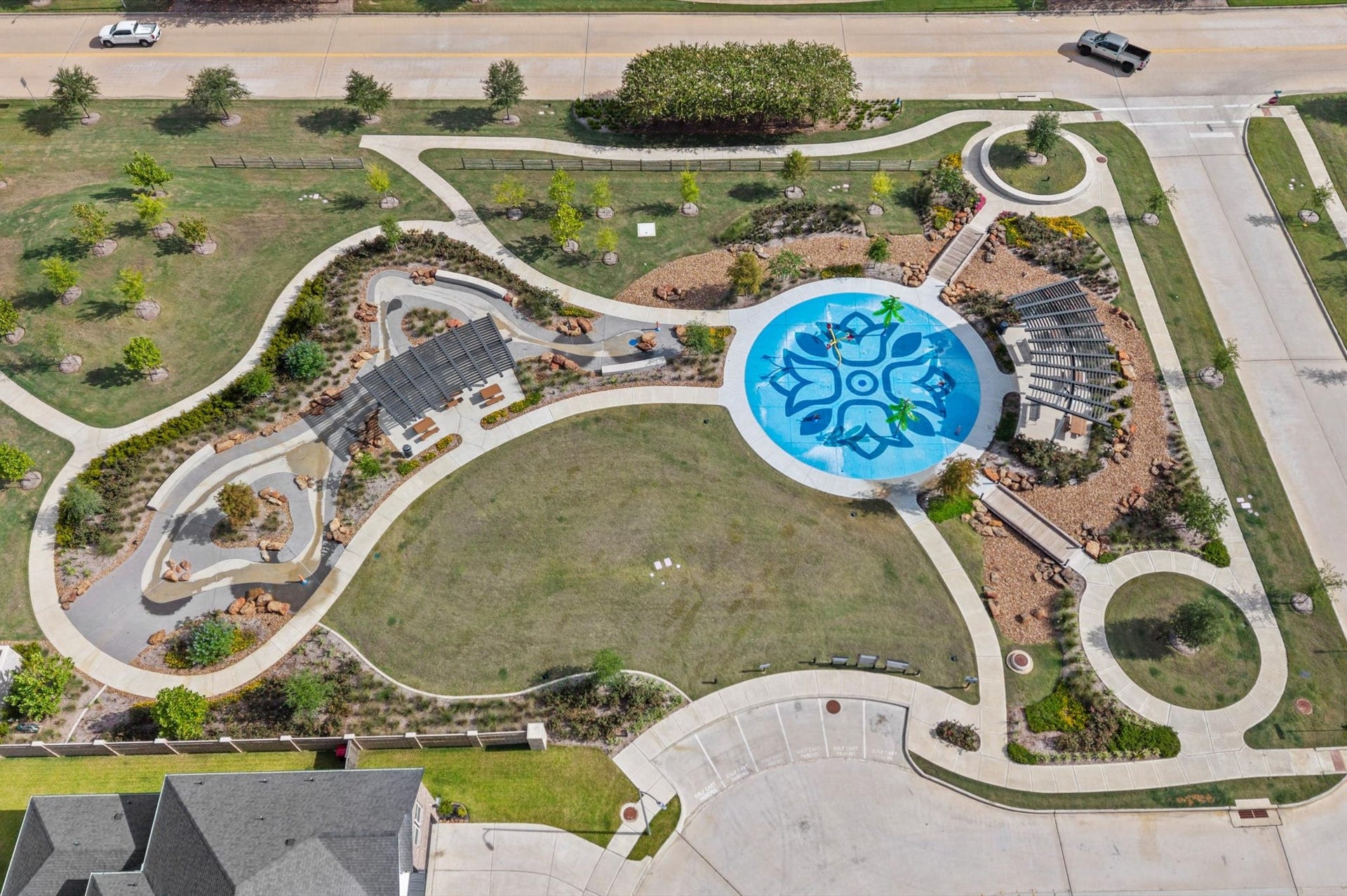 Photo of the splash pad and park area.