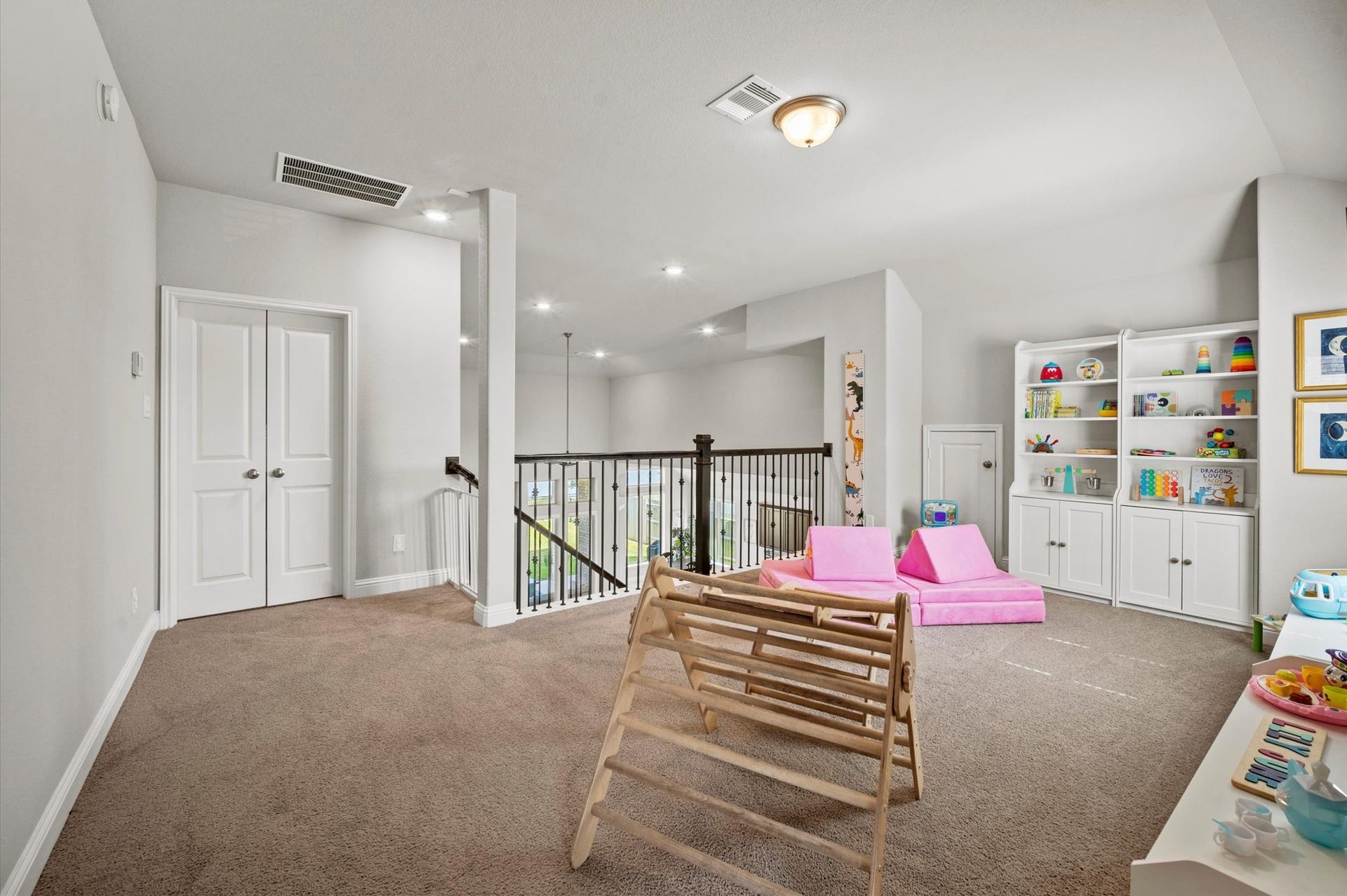 Playroom located at the top of the stairs.