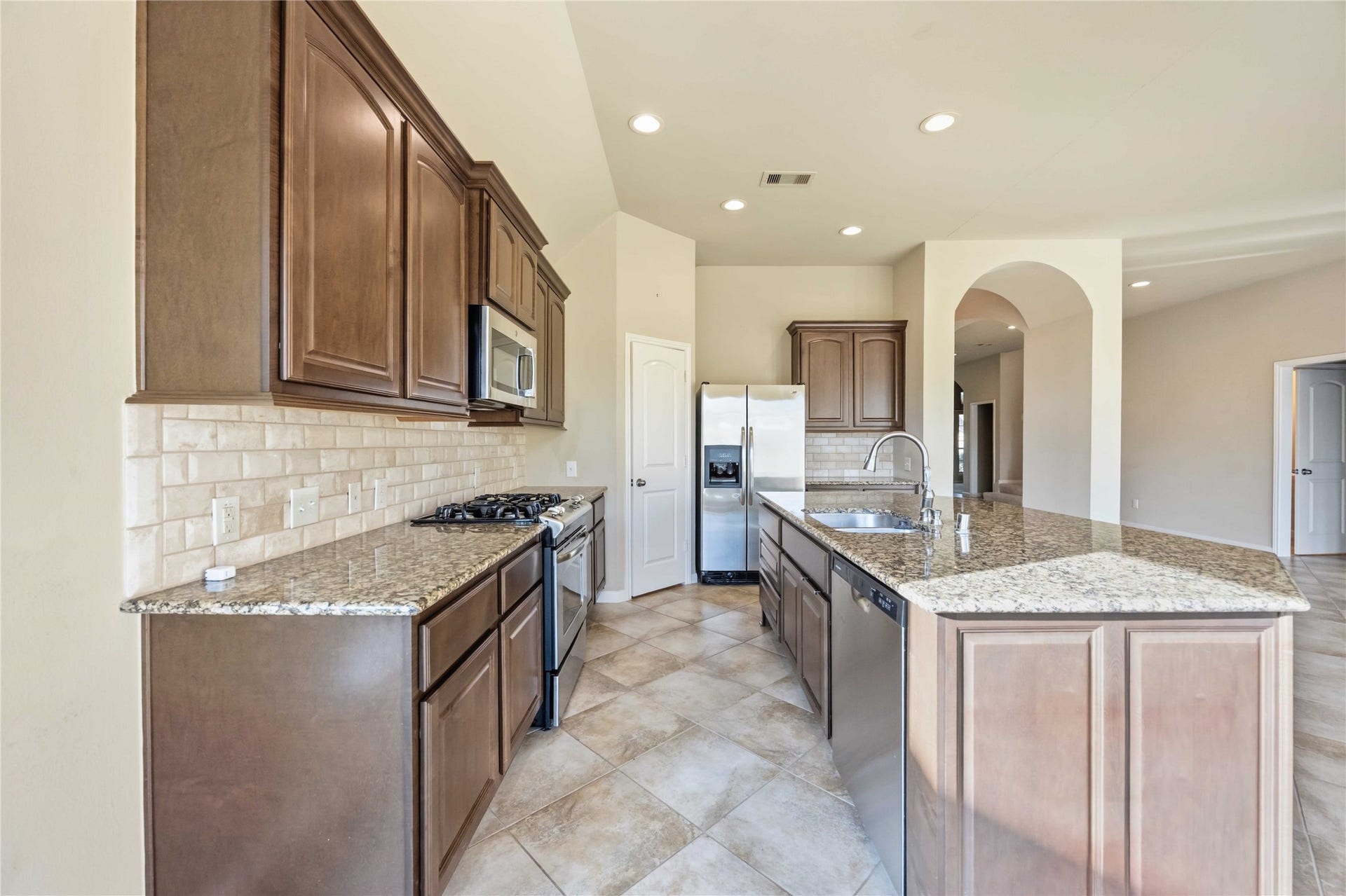 13615 Rainwater Drive, Pearland, TX 77584 This photo has been virtually staged.