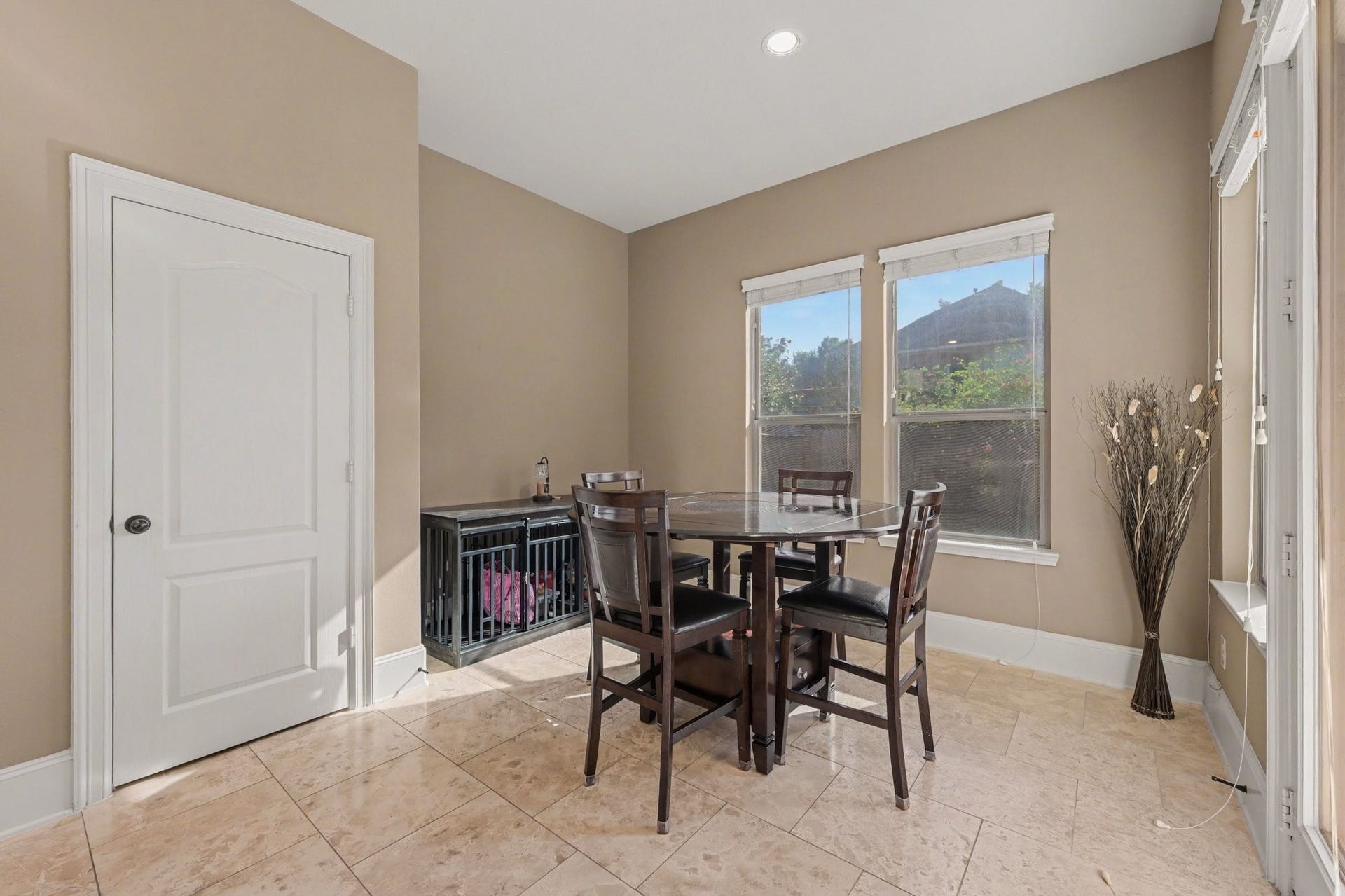 6410 Archer Ranch Lane, Rosenberg, TX 77471 Bright and inviting breakfast nook with large windows overlooking the backyard.