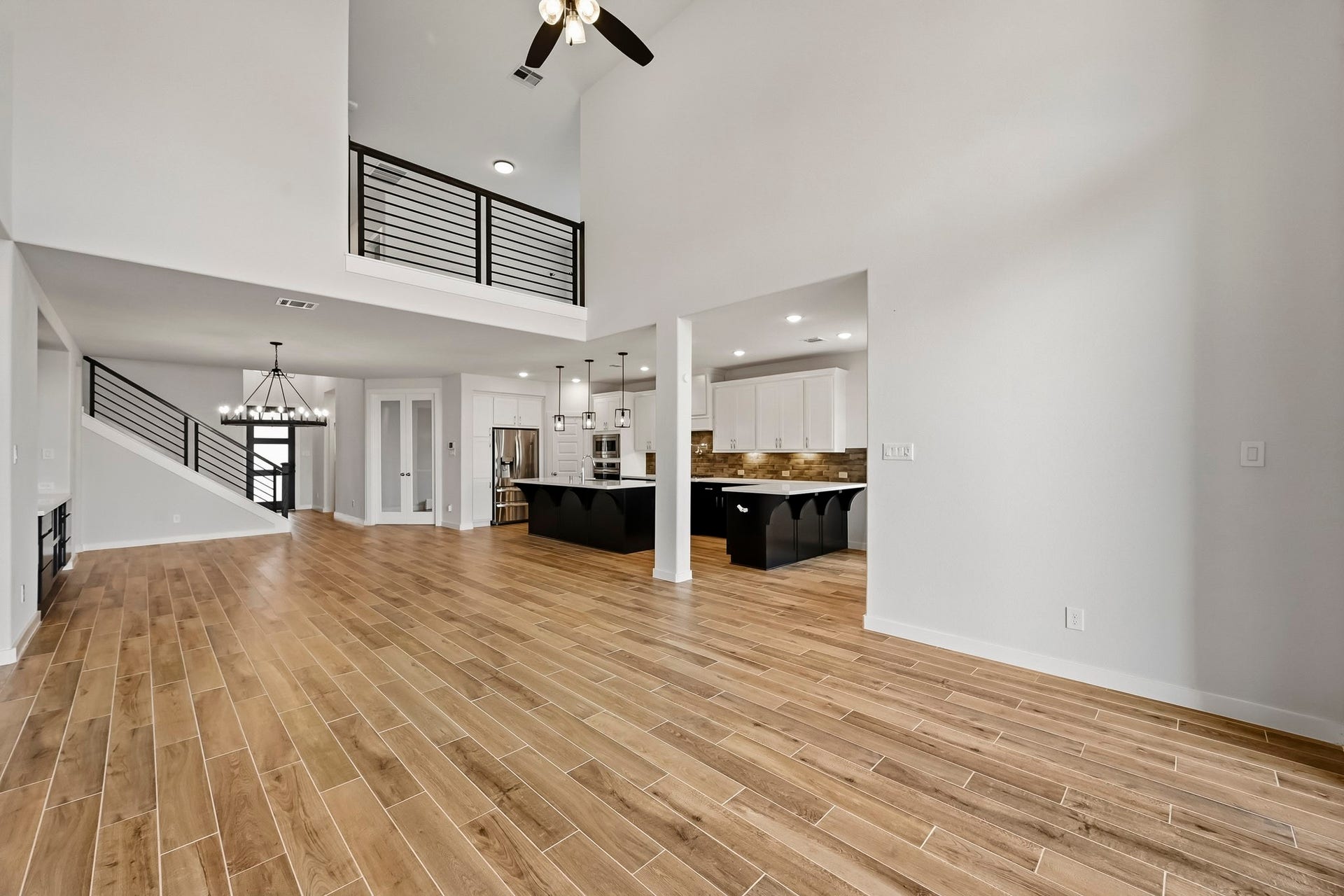 6718 Waxbill Road, Katy, TX 77493 Another view shows just how open concept this kitchen and living room is. So much natural light and space! This light and bright spacious living room is the perfect layout for entertaining or just relaxing!