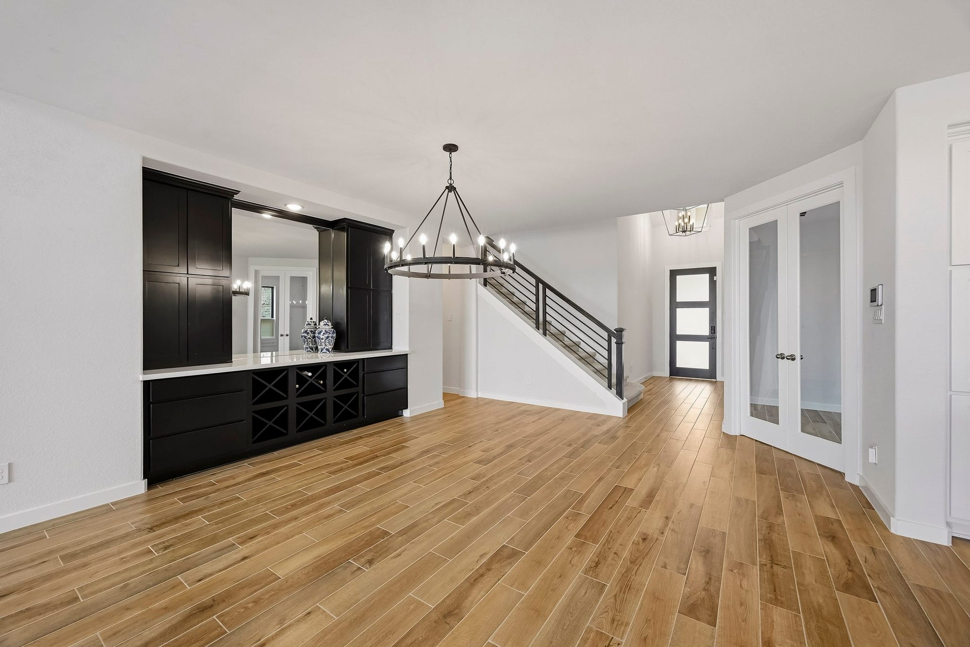 6718 Waxbill Road, Katy, TX 77493 Make memories gathered around the table with your family and friends! This dining room features beautiful built-ins with extra storage and countertop space for a wine or coffee nook.