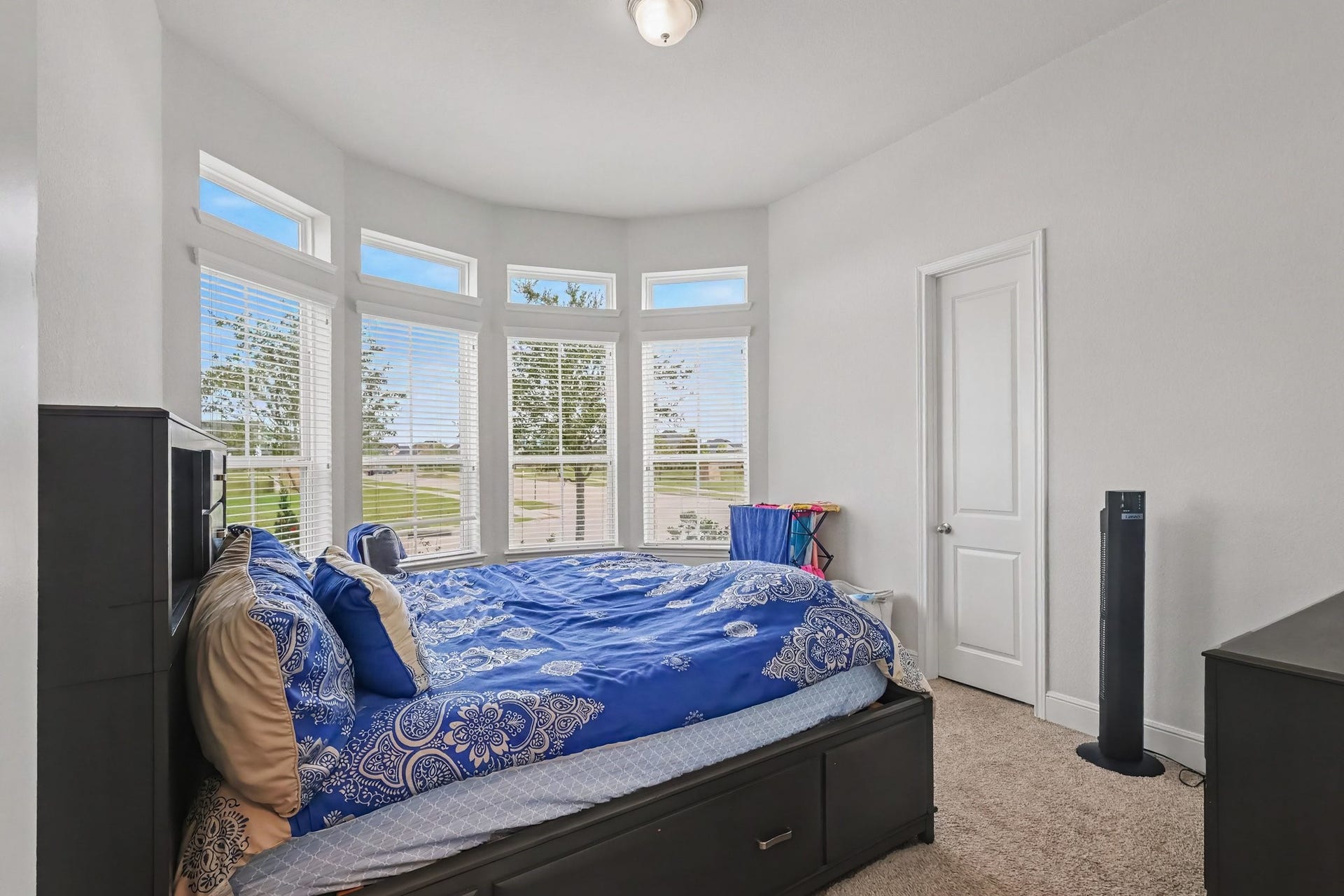 14303 Paseo Marbella Drive, Cypress, TX 77433 Bedroom with ensuite at the front of the home
