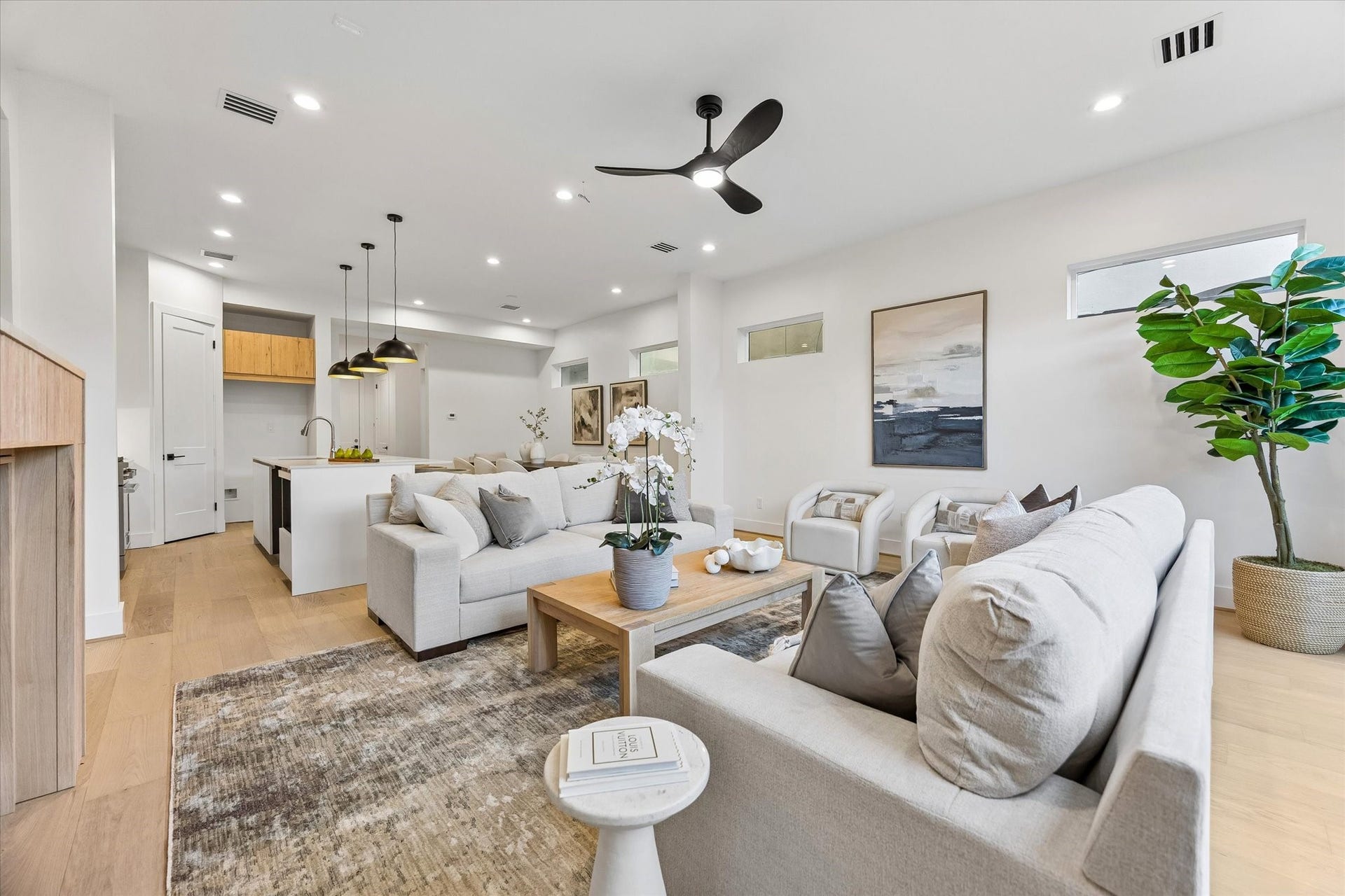 2204 Huldy Street, Houston, TX 77019 One more of this spacious family room highlighting the seamless open floor plan to kitchen & dining! Ideal for entertaining and every day living!