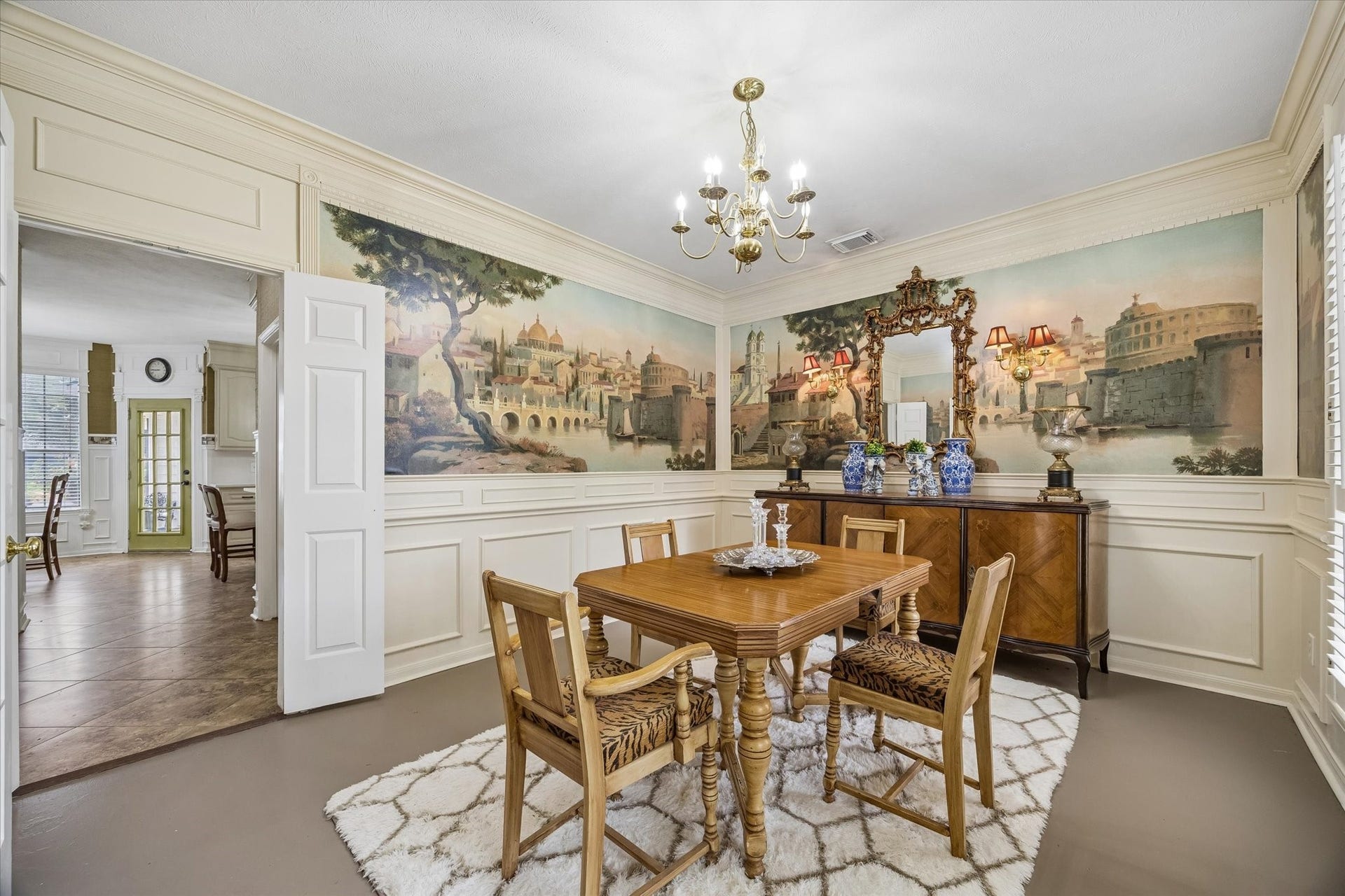 1019 Quiet Glen Court, Sugar Land, TX 77479 Dining room with an entrance to the kitchen, power room and laundry room.