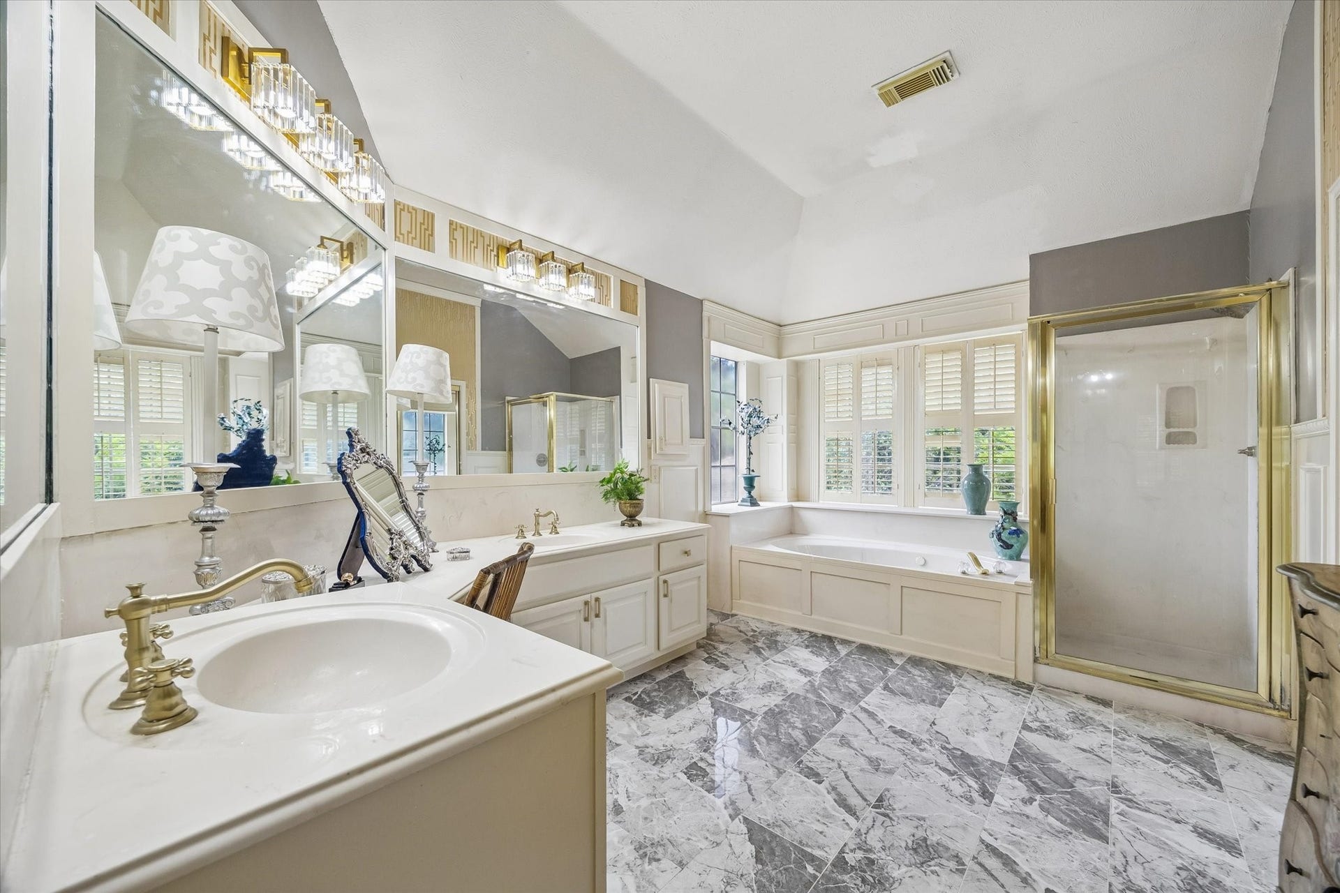 1019 Quiet Glen Court, Sugar Land, TX 77479 Primary bathroom with double sinks, area for makeup, separate tub and shower.