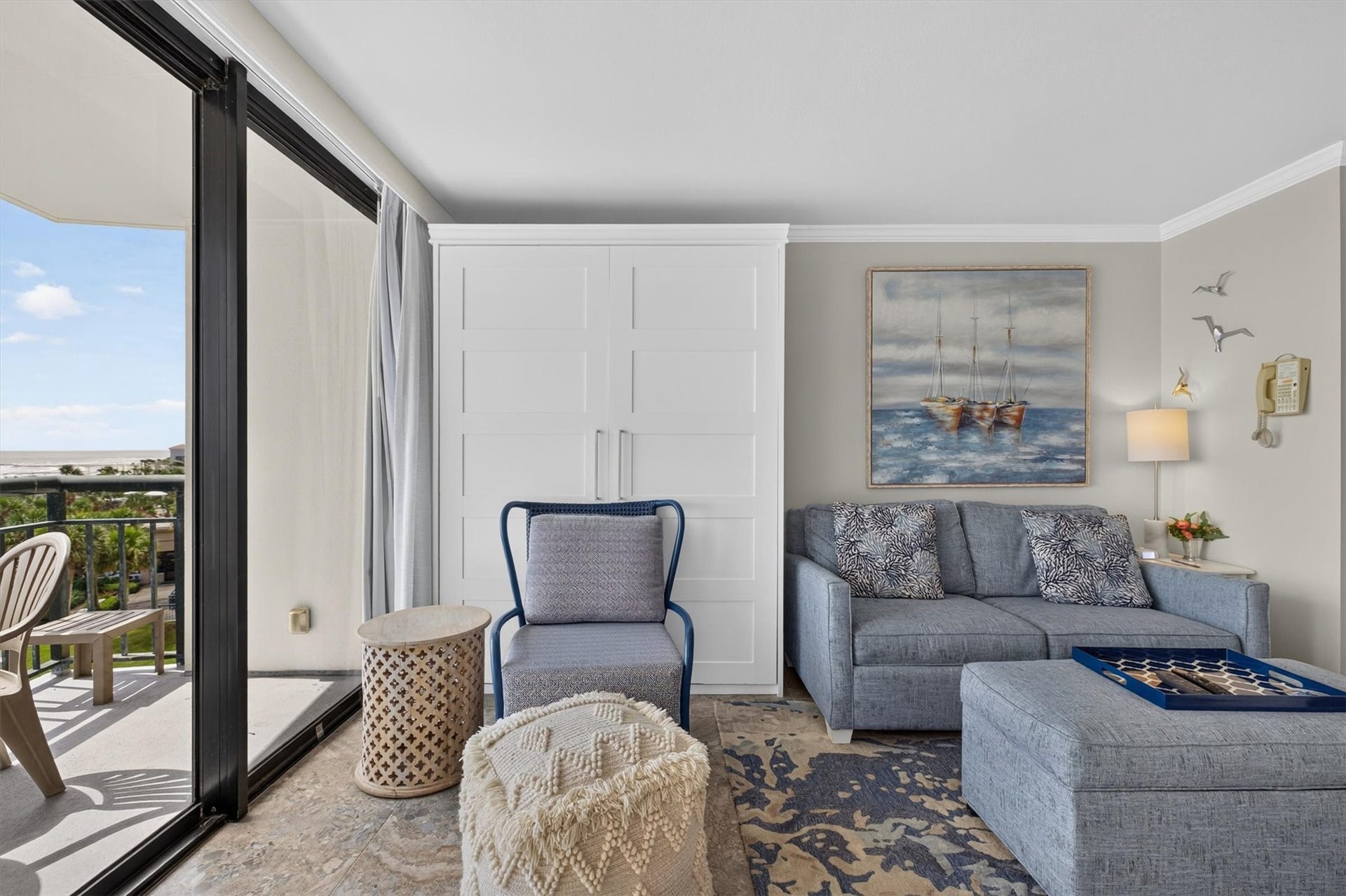 5220 Seawall Boulevard, #737D, Galveston, TX 77551 THE MURPHY BED IS TO THE LEFT OF THE SOFA.