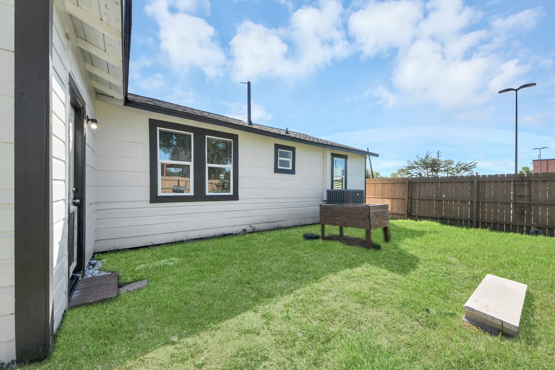 801 Mabel Street, Richmond, TX 77469 spacious backyard