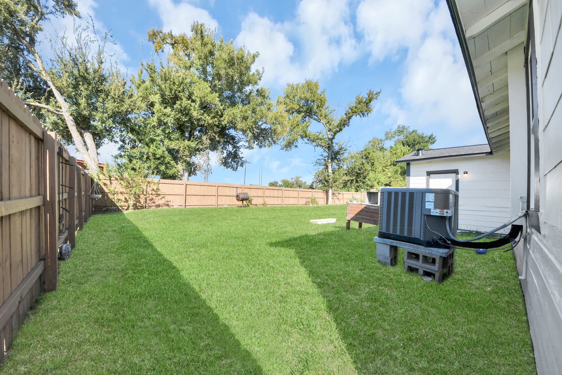 801 Mabel Street, Richmond, TX 77469 spacious backyard