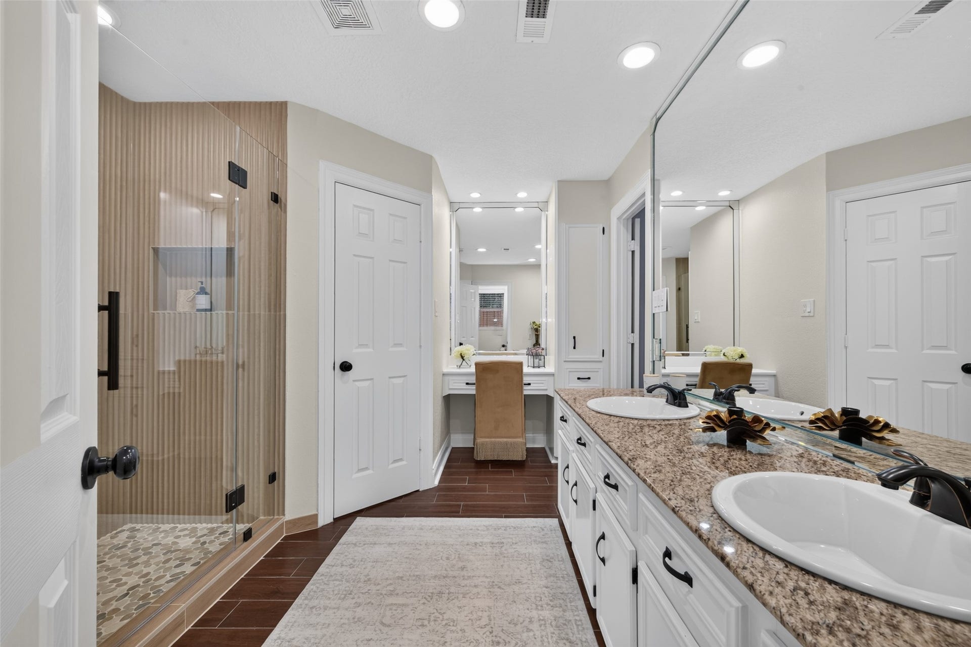 8906 Seber Drive, Tomball, TX 77375 Spacious primary bath also includes a dedicated vanity area with additional storage and counter space.