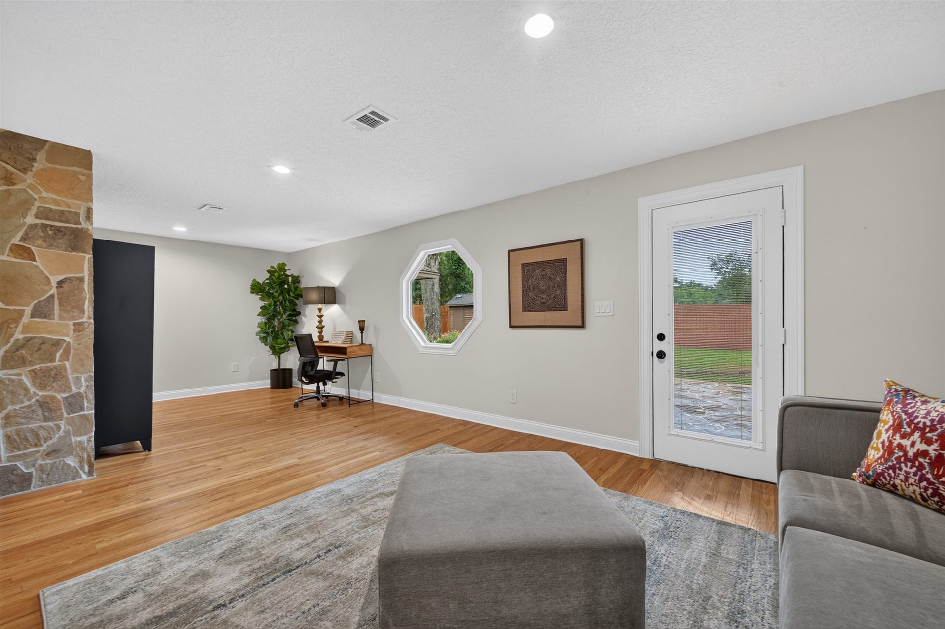 8906 Seber Drive, Tomball, TX 77375 Let your ideas soar as you create this bonus space to fit your lifestyle. The room overflows with natural light and from the backyard.