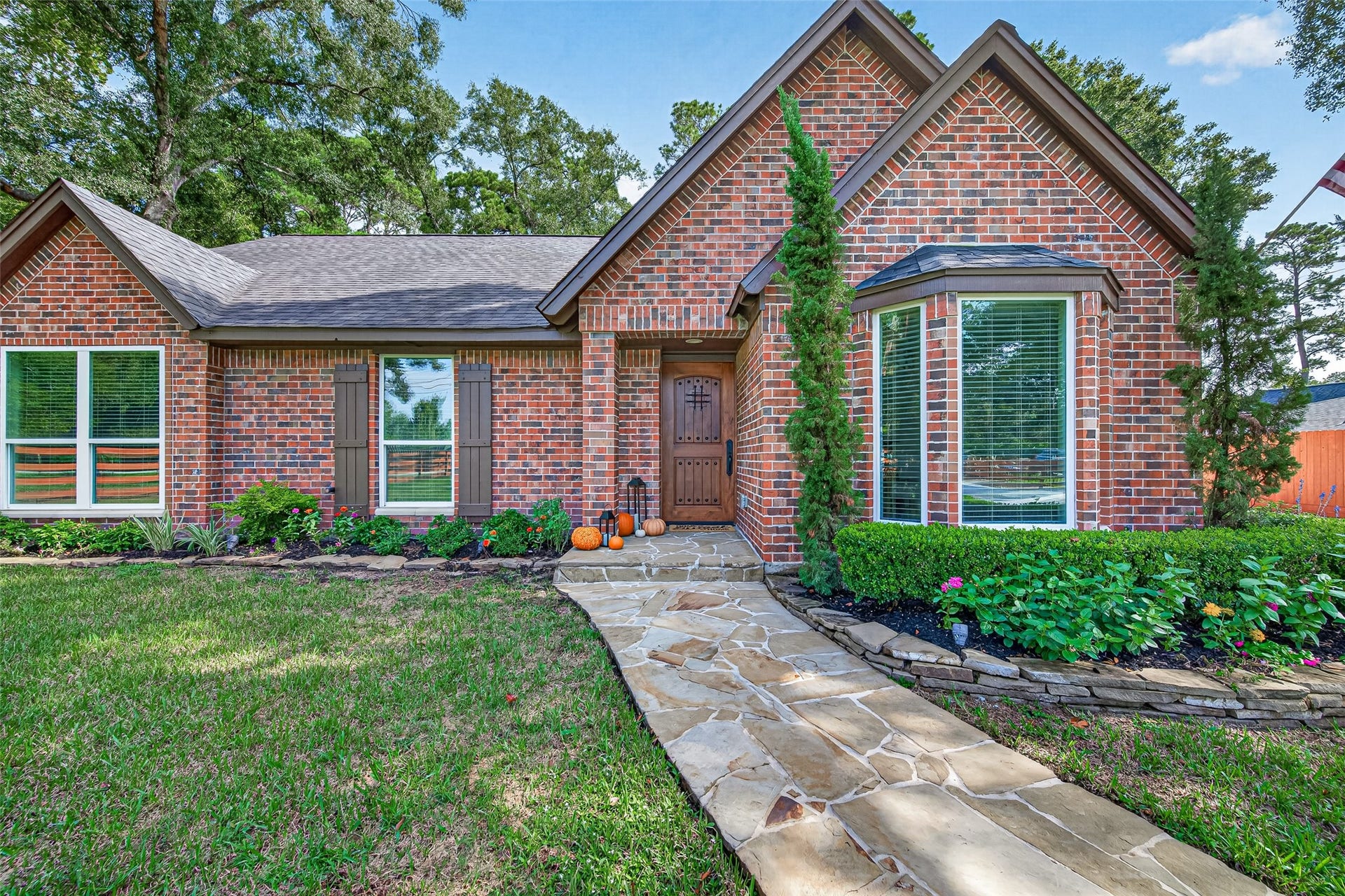 8906 Seber Drive, Tomball, TX 77375 Welcome home! Beautiful brick exterior, mature trees and inviting curb appeal.