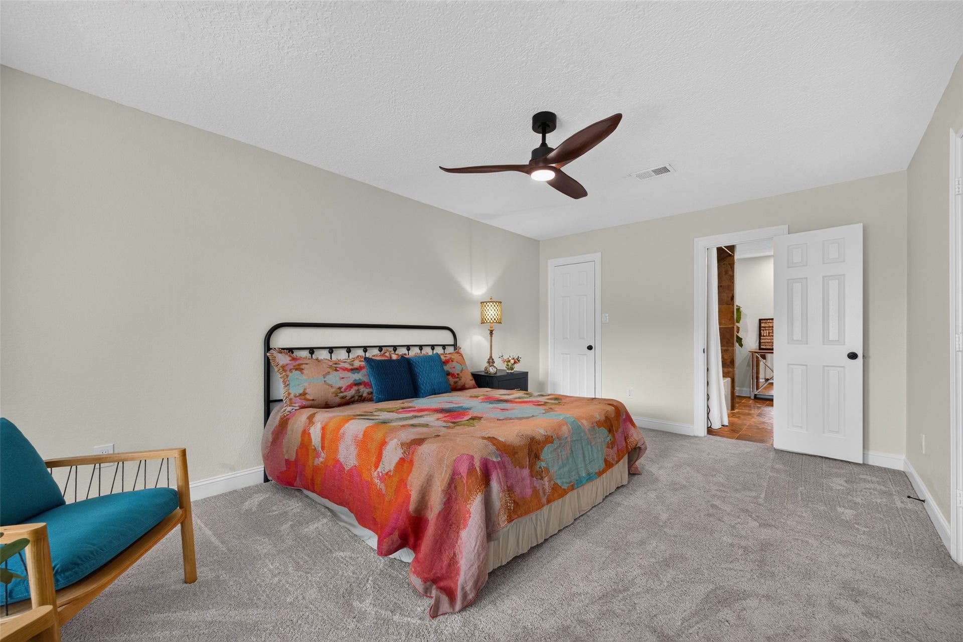 8906 Seber Drive, Tomball, TX 77375 Another view showcases the generous proportions of this secondary bedroom and its comfortable, flexible layout with direct access to the guest bath.