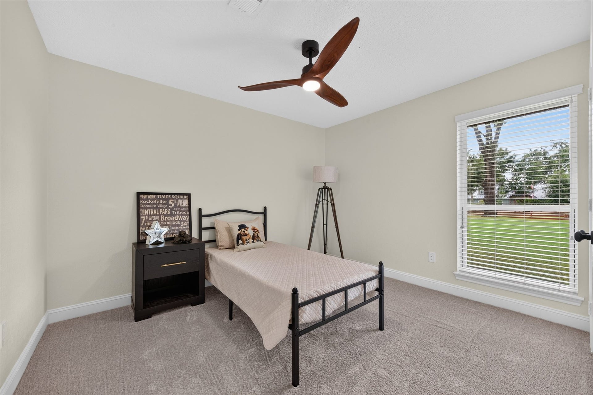 8906 Seber Drive, Tomball, TX 77375 Additional secondary bedroom features great natural light, ample closet space and plenty of room to make it your own.