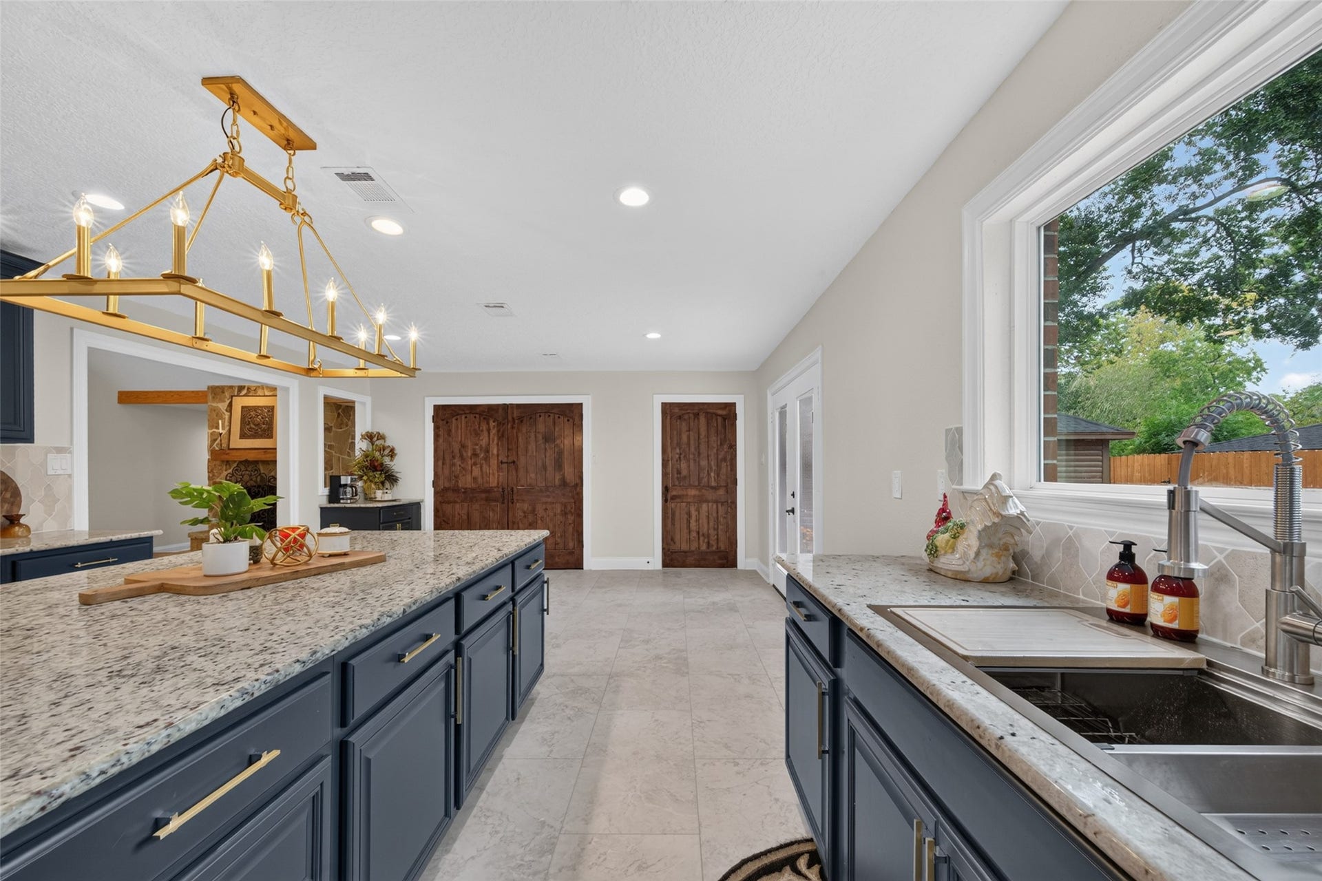 8906 Seber Drive, Tomball, TX 77375 Another view highlighting the overflow of natural light and ample counter and work space.
