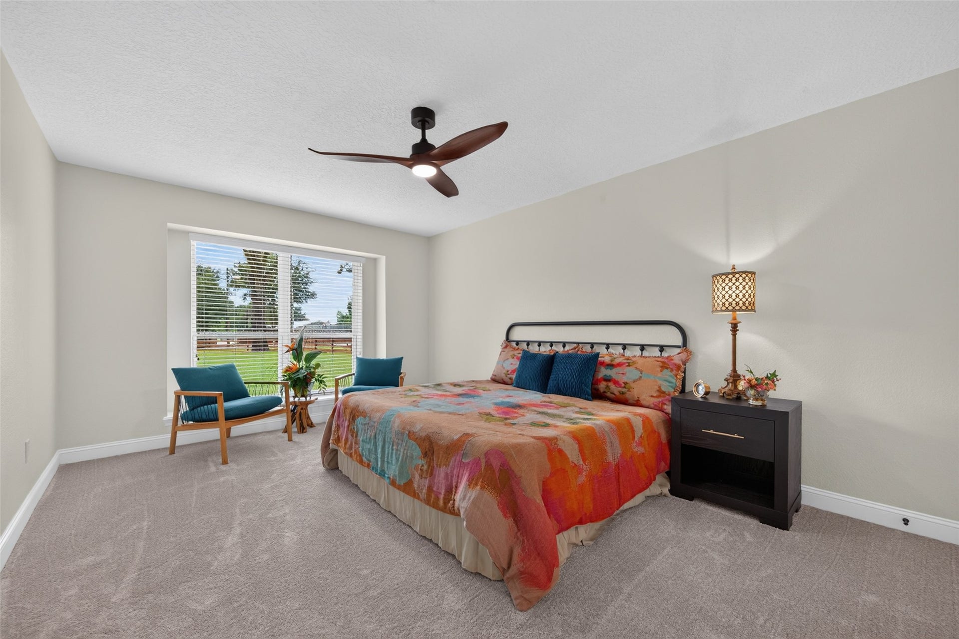 8906 Seber Drive, Tomball, TX 77375 Spacious secondary bedroom offers plenty of room for a larger bed, additional furniture and a sitting area.