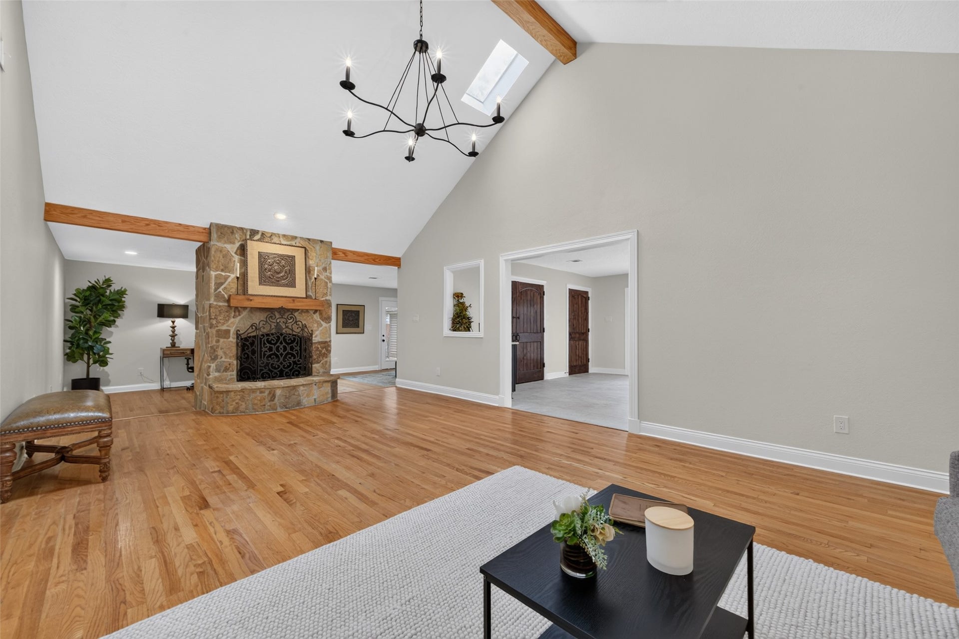 8906 Seber Drive, Tomball, TX 77375 Stone fireplace creates a beautiful focal point in the spacious living area.