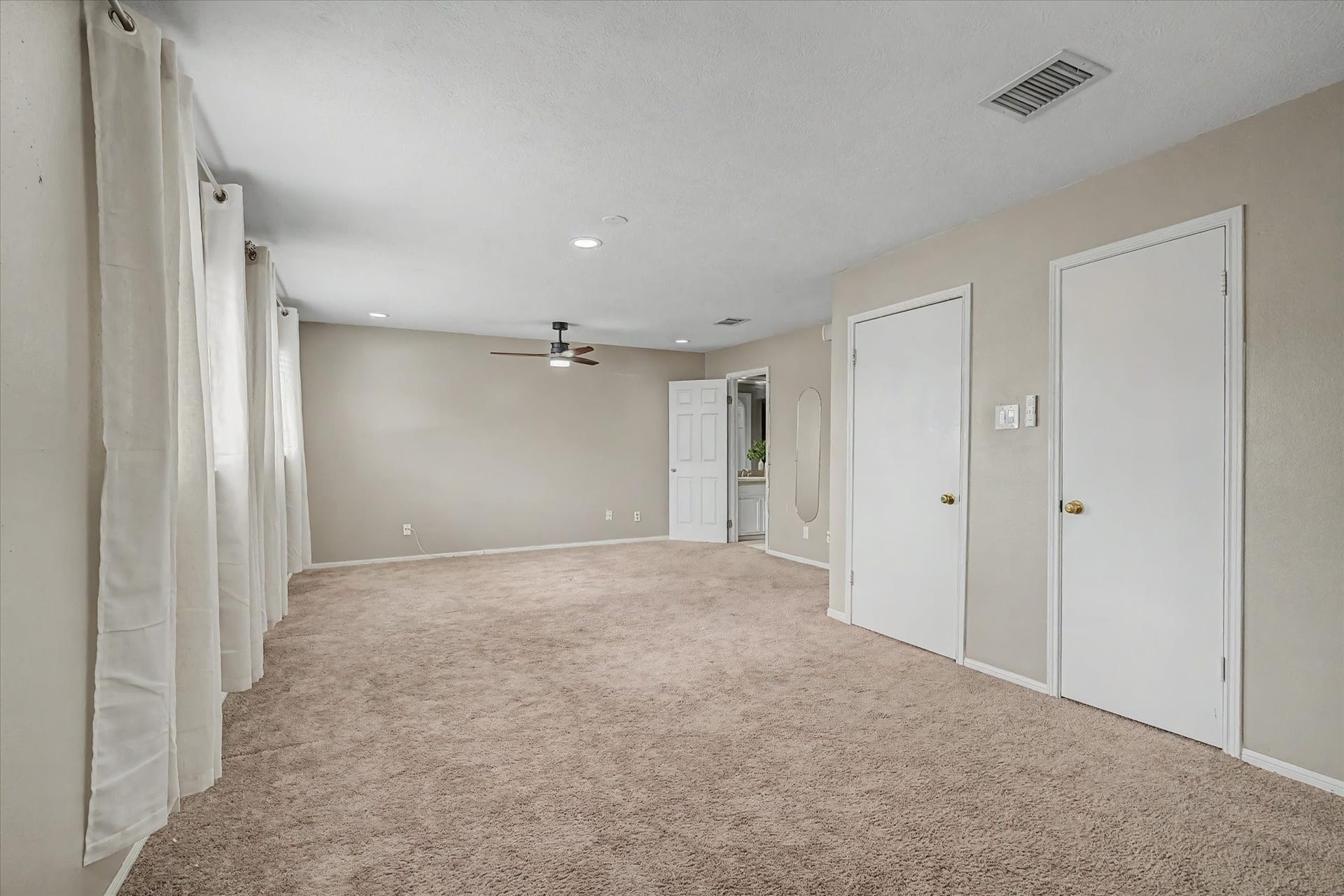 Another angle of the primary bedroom