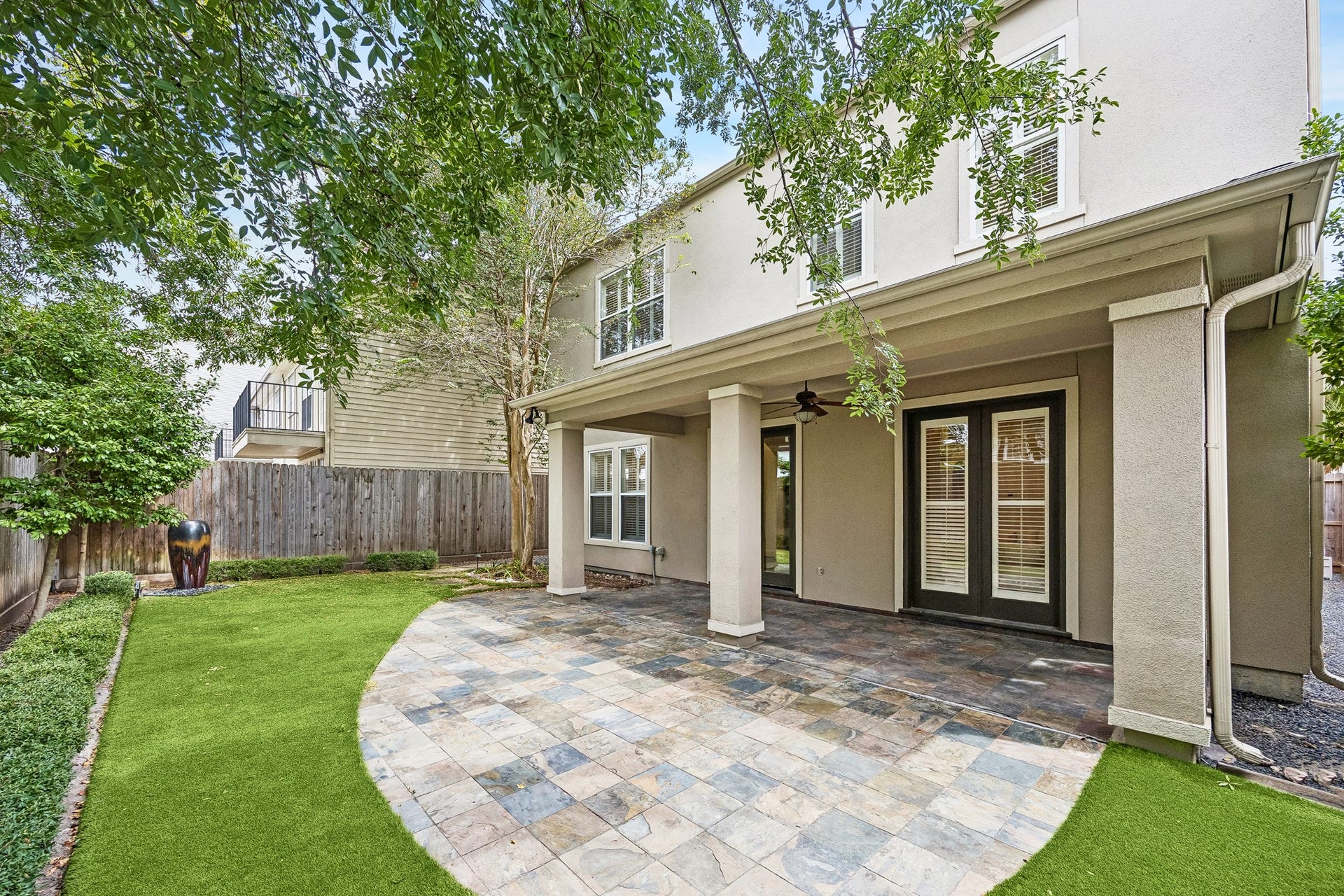 2214 Driscoll Street, Houston, TX 77019 Another fantastic view of the covered patio / green space - tons of room for kids and pets to play!