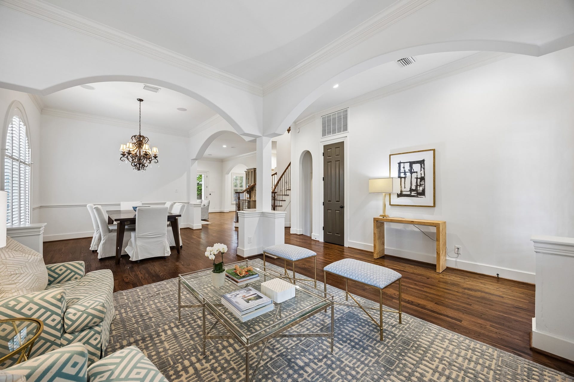 2214 Driscoll Street, Houston, TX 77019 Additional view of the entry, dining and formal living space. There is an effortless flow between rooms. This area also hosts the powder bathroom (through the arched opening).