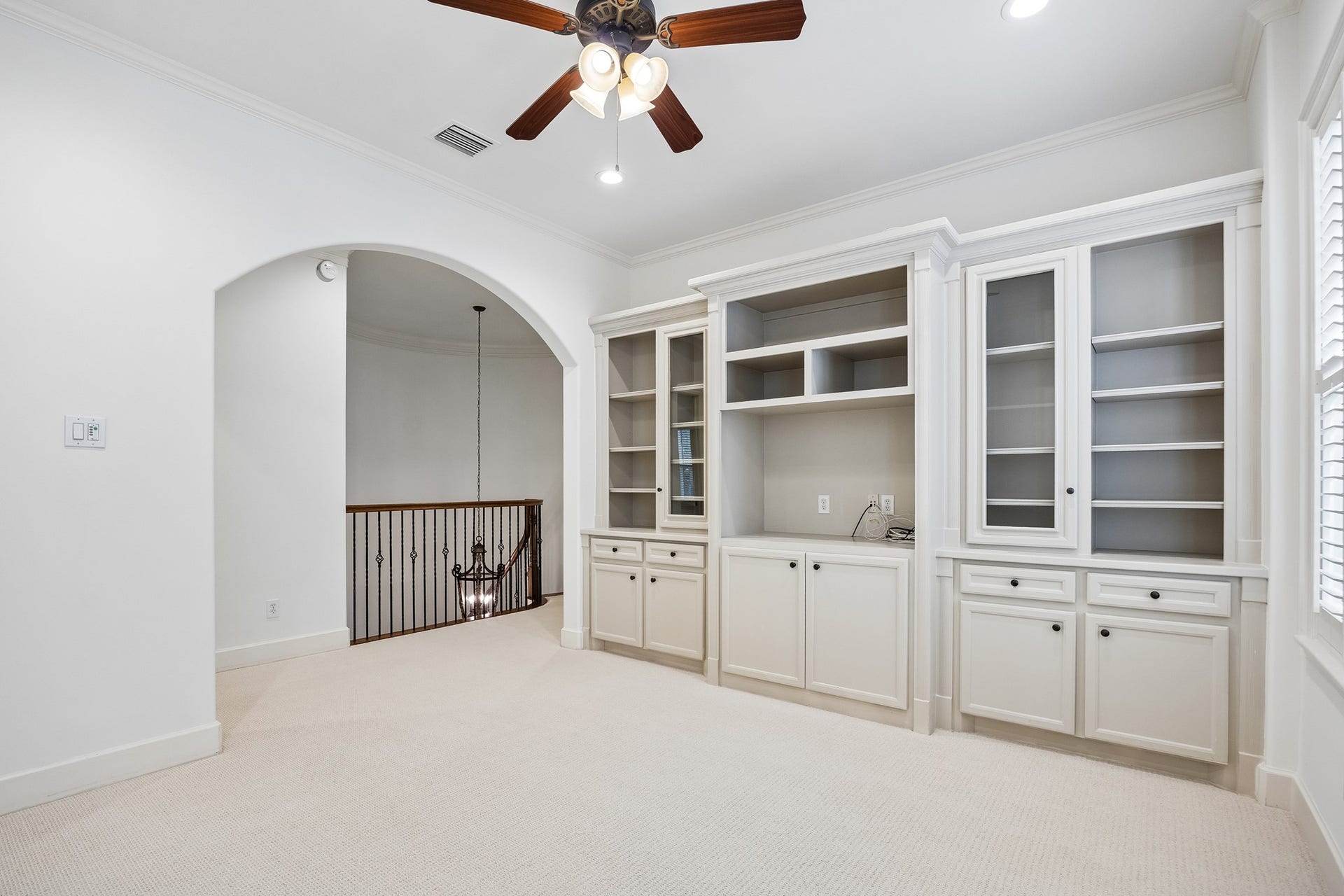2214 Driscoll Street, Houston, TX 77019 Upstairs, you're greeted with a playroom / media room with custom built-ins.