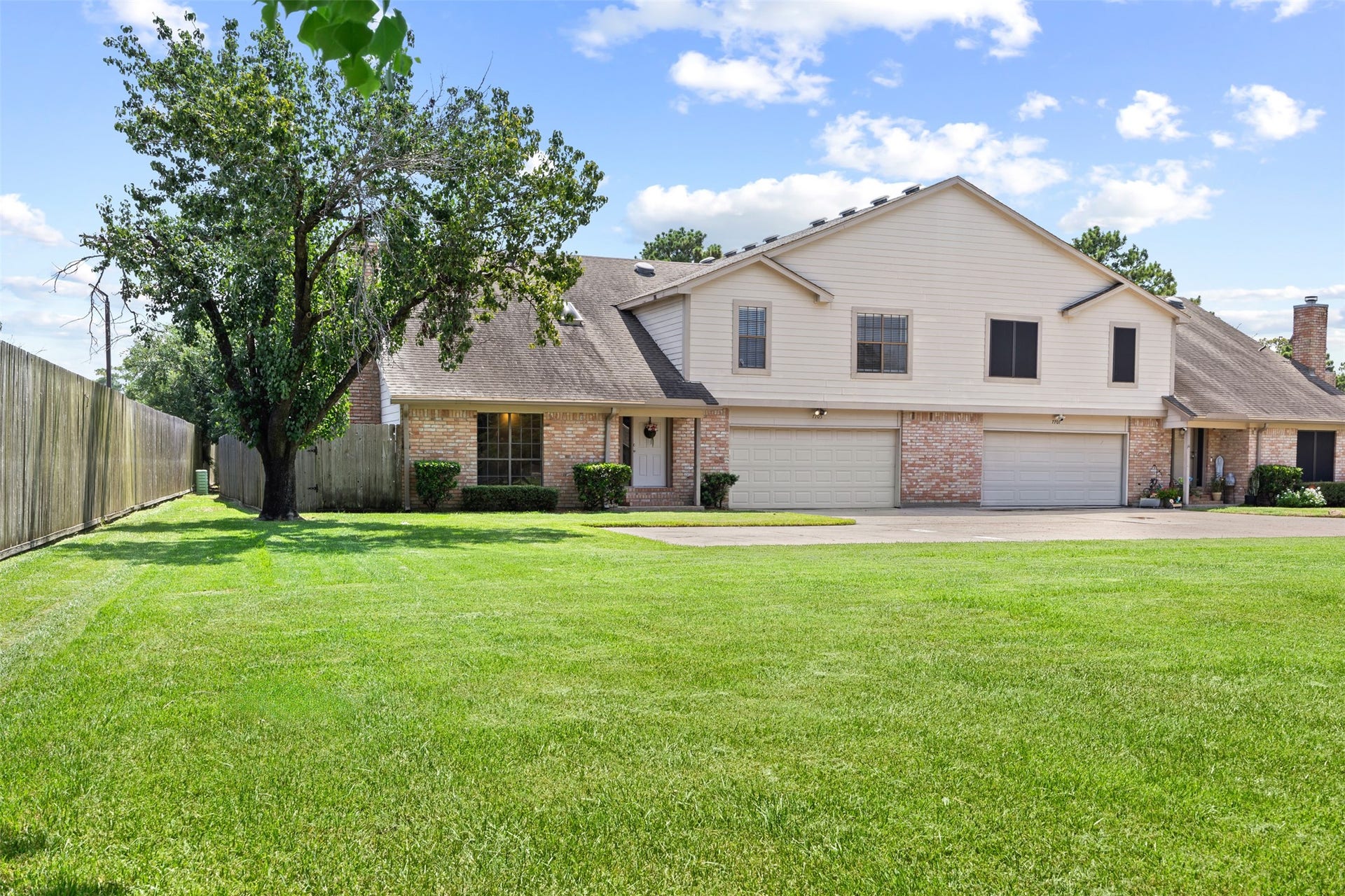 7705 Theissetta Drive, #158, Spring, TX 77379 Welcome home to this beautifully maintained end-unit condominium featuring an attached two-car garage and added privacy with expansive green space and a large shade tree creating a park-like setting.