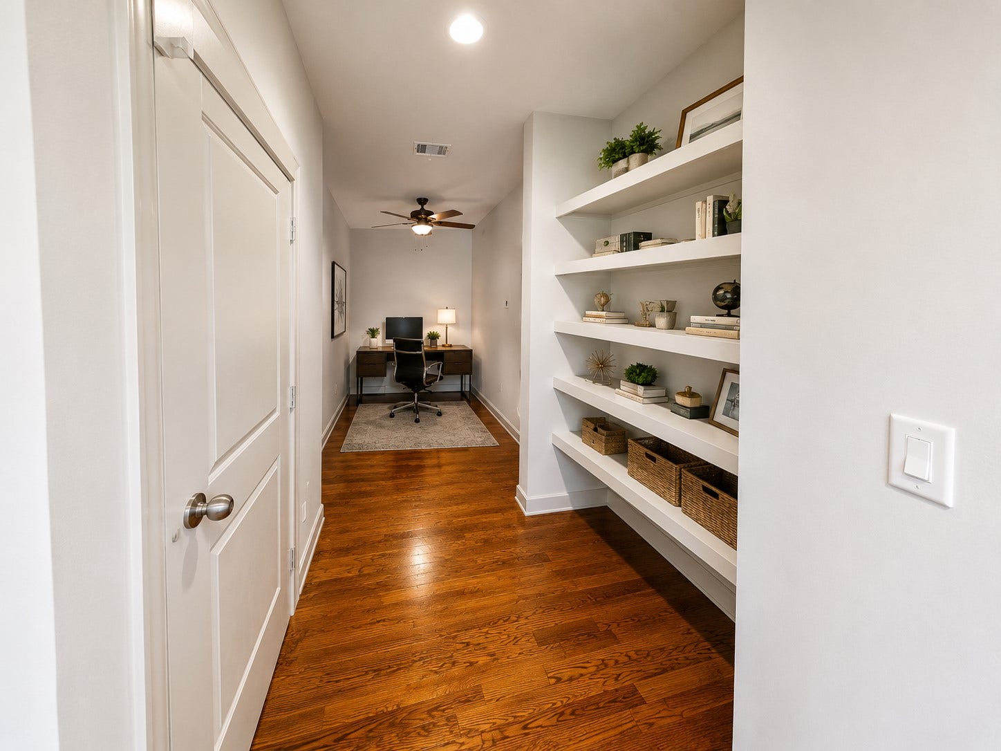 1400 McKinney Street, #2401, Houston, TX 77010 Welcoming entry opens to a versatile private study, offering the perfect space for a refined home office or flex room.