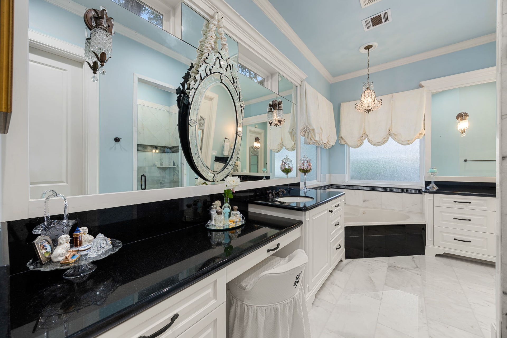 13110 Tosca Lane, Houston, TX 77079 Primary bathroom has double sinks, a soaking tub, large shower, and spacious walk in closet.