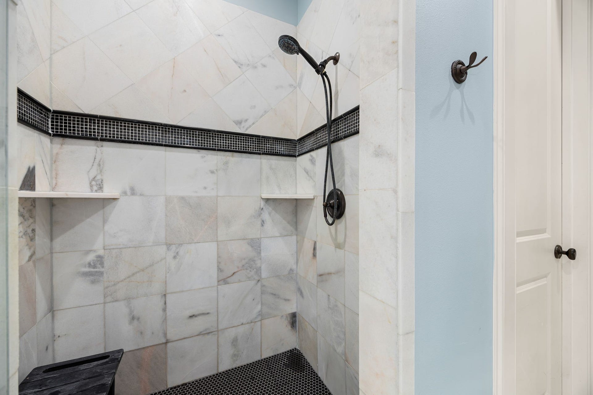 13110 Tosca Lane, Houston, TX 77079 Primary shower. The door to the right leads to the private water closet.