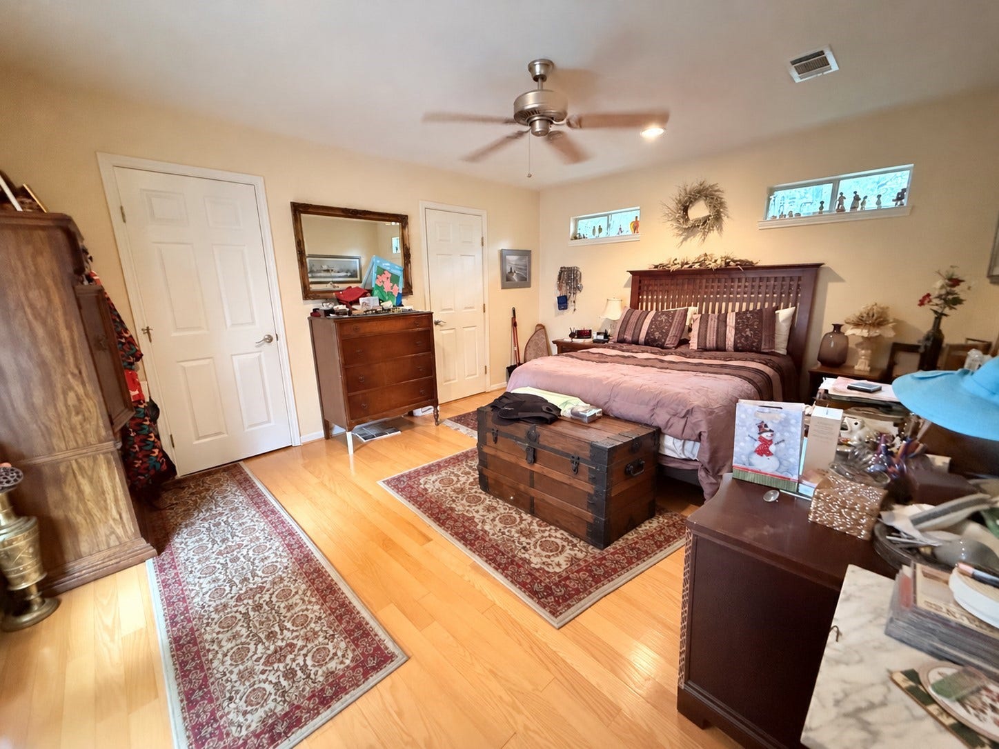 1600 Carriage Run W, Conroe, TX 77384 A Second Primary Suite or Private Guest Quarters! Offering exceptional flexibility, this spacious bedroom is ideal as a second primary suite or comfortable guest accommodations. Beautiful wood flooring adds warmth, while two clerestory windows welcome natural light without sacrificing privacy. A private en-suite bath and generous walk-in closet provide comfort and convenience, while direct exterior access to the backyard is an added bonus. A wonderful space for guests or multigenerational living!