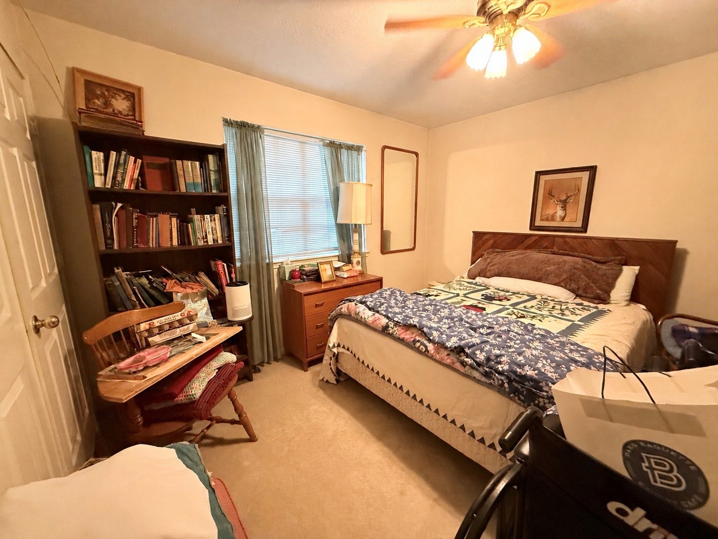 1600 Carriage Run W, Conroe, TX 77384 Bright, Comfortable & Convenient! Bedroom 3 offers a welcoming space filled with natural light from a sunny window. A spacious wall closet provides convenient storage, while a lighted ceiling fan adds everyday comfort. With easy hallway access to the home's third full bath, this inviting bedroom is ideal for family members or overnight guests!