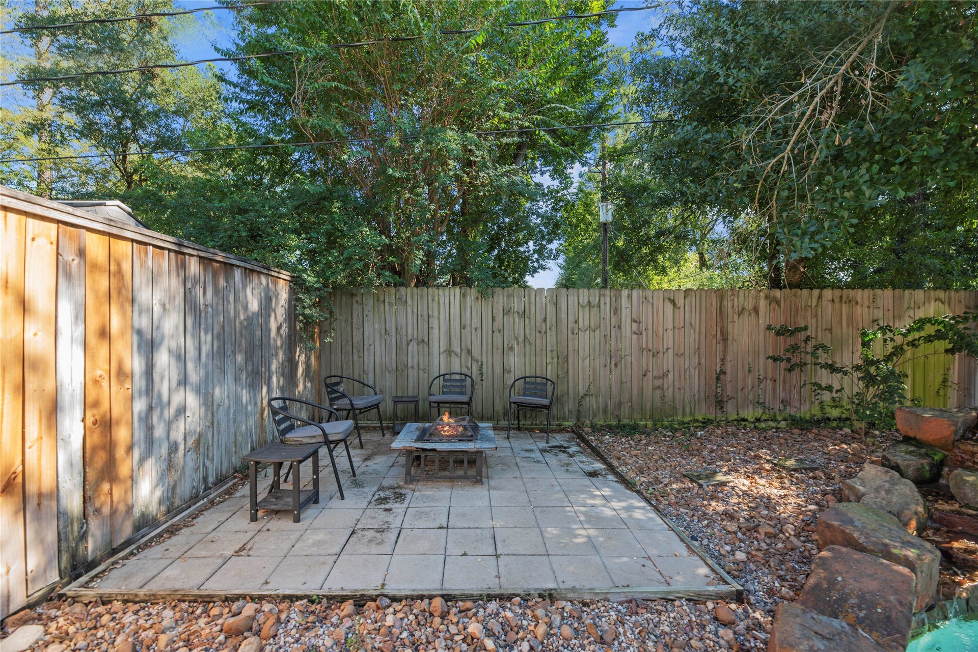 5823 Ashmere Lane, Spring, TX 77379 When the sun goes down, the fun doesn't have to stop. This tucked away fire pit area offers a cozy spot to gather with friends, share stories and enjoy a little fresh air. Just add your favorite people and maybe a few marshmallows.