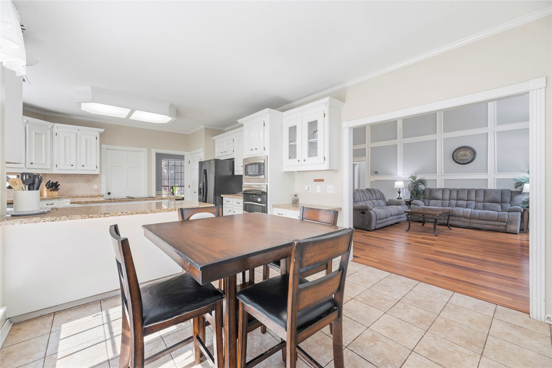 5823 Ashmere Lane, Spring, TX 77379 The open layout connects the kitchen, breakfast area and family room, making everyday living and entertaining easy. Whether preparing dinner, catching up with family or hosting friends, this inviting space brings everyone together beautifully.
