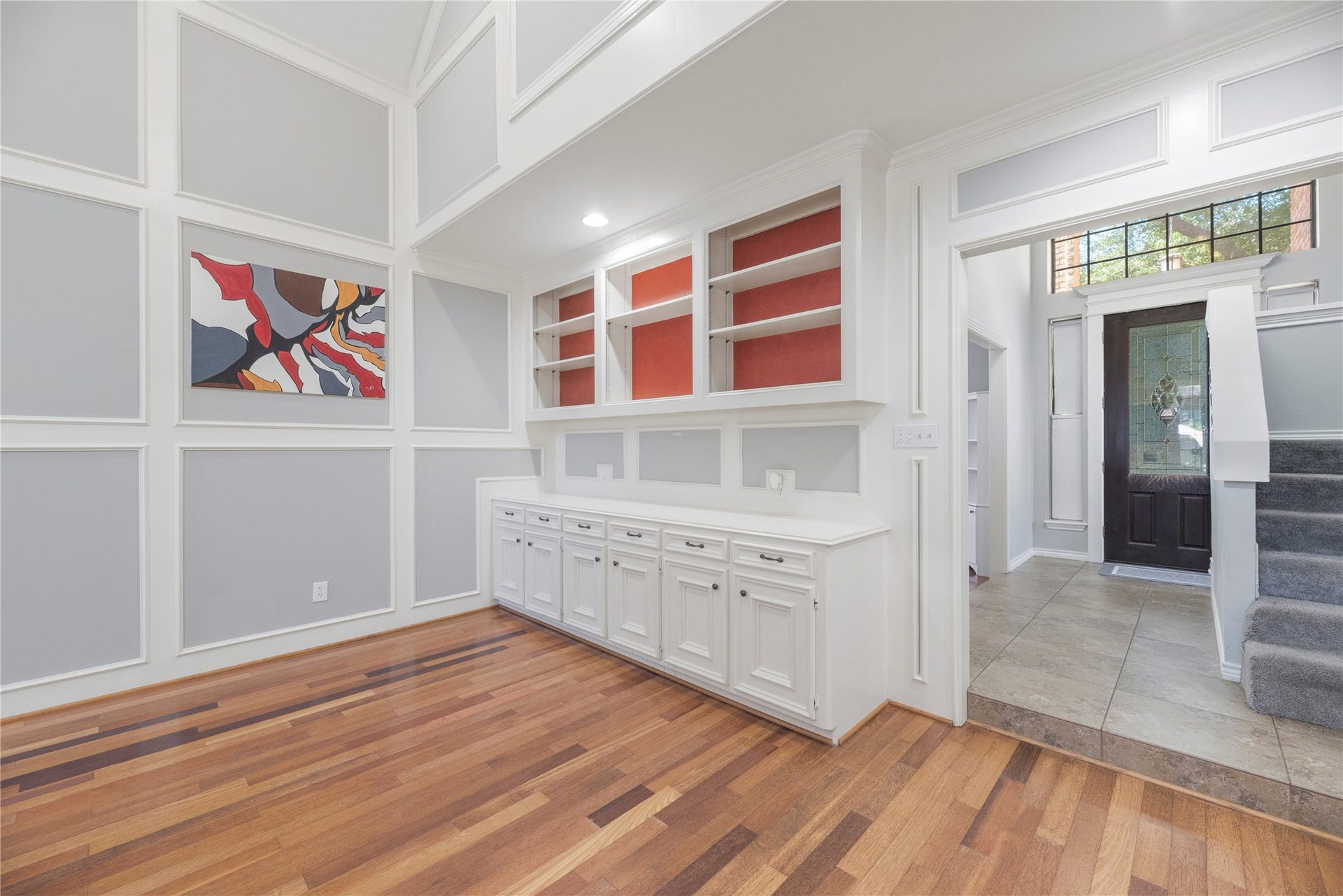 5823 Ashmere Lane, Spring, TX 77379 Beautiful custom built-ins offer plenty of space to display favorite photos, books and collectibles, with ample cabinetry below to keep everyday essentials neatly tucked away.