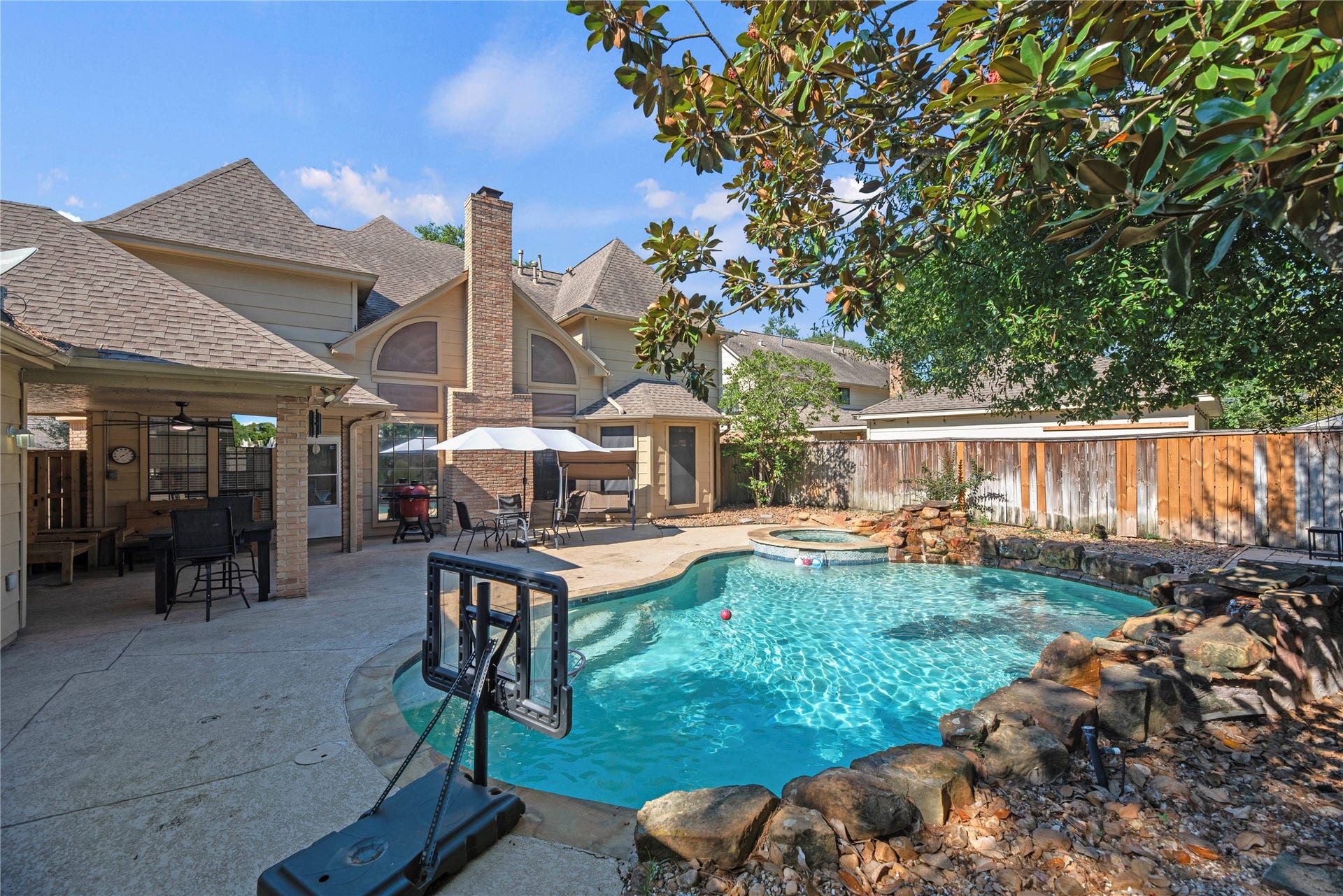 5823 Ashmere Lane, Spring, TX 77379 Here, everyday living starts to feel like a vacation. With a heated pool, relaxing spa and plenty of room to entertain, there's something for everyone to enjoy. And with a full sprinkler system helping maintain the lawn and landscaping, you can spend a little less time on yard work and more time poolside.