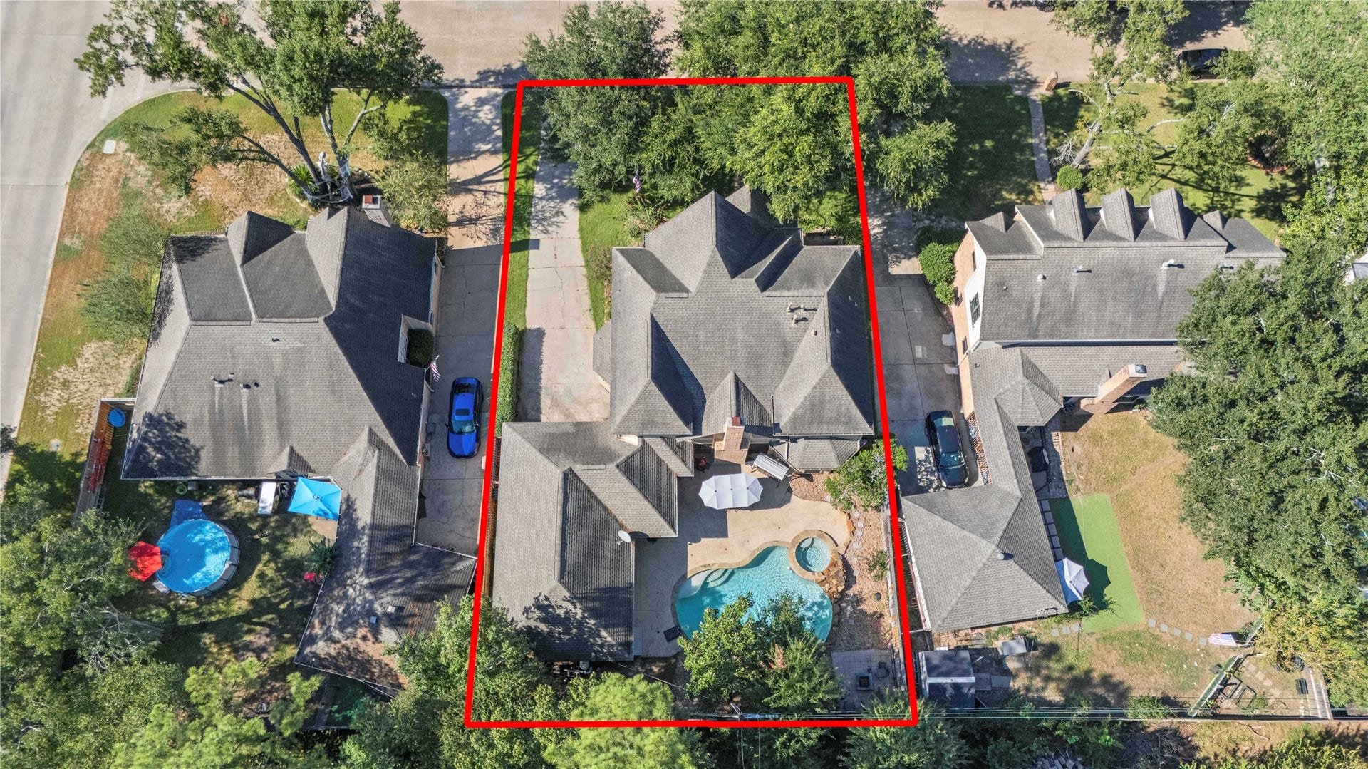 5823 Ashmere Lane, Spring, TX 77379 Here's a bird's eye view of what makes this backyard so special. A heated pool, relaxing spa, spacious patio and separate fire pit area offer plenty of ways to enjoy the outdoors. From sunny afternoons by the pool to cozy evenings under the stars, there's room for it all.