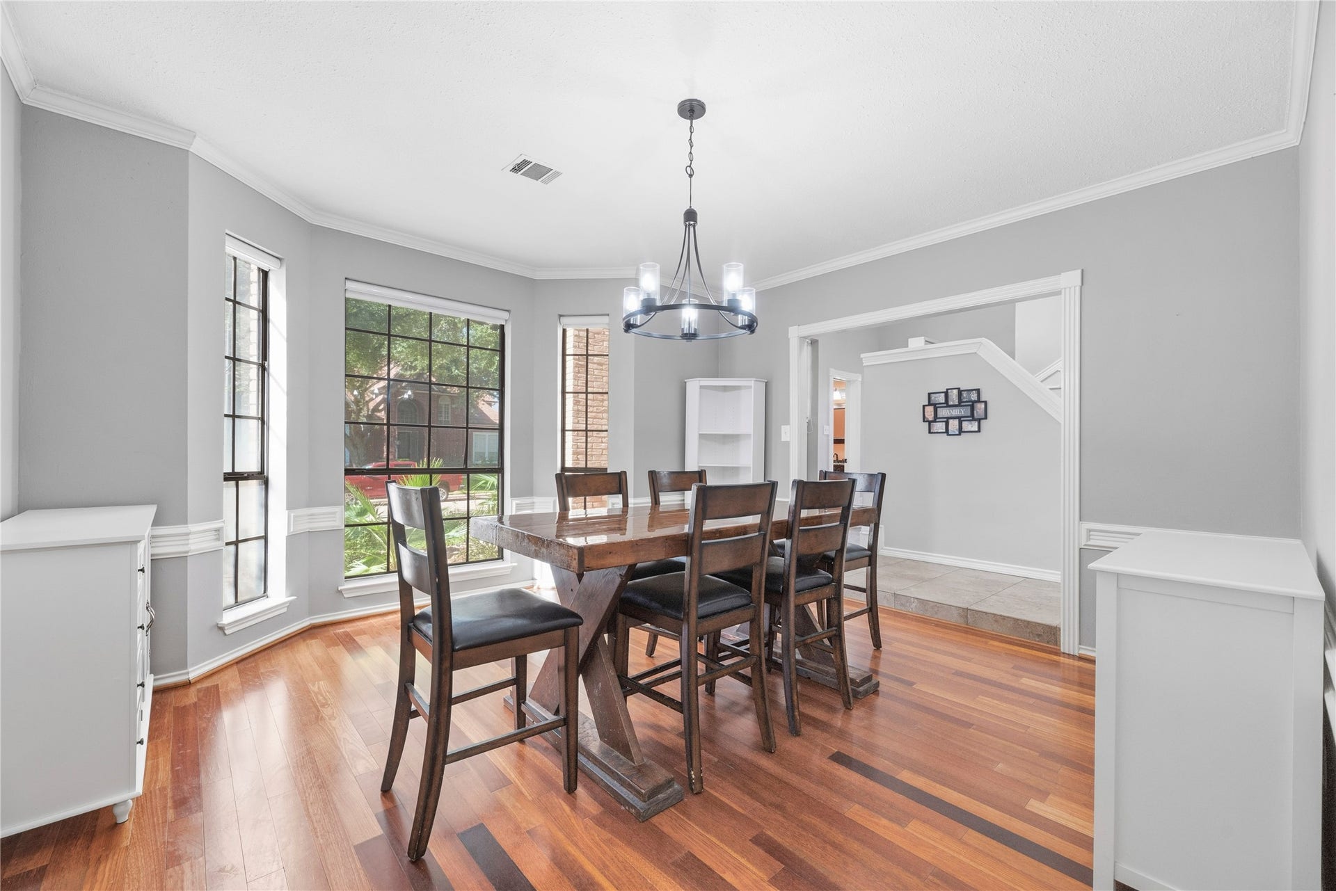 5823 Ashmere Lane, Spring, TX 77379 Gather with family and friends in this spacious formal dining room, where large windows offer lovely front yard views and easy access to the kitchen makes entertaining a breeze.