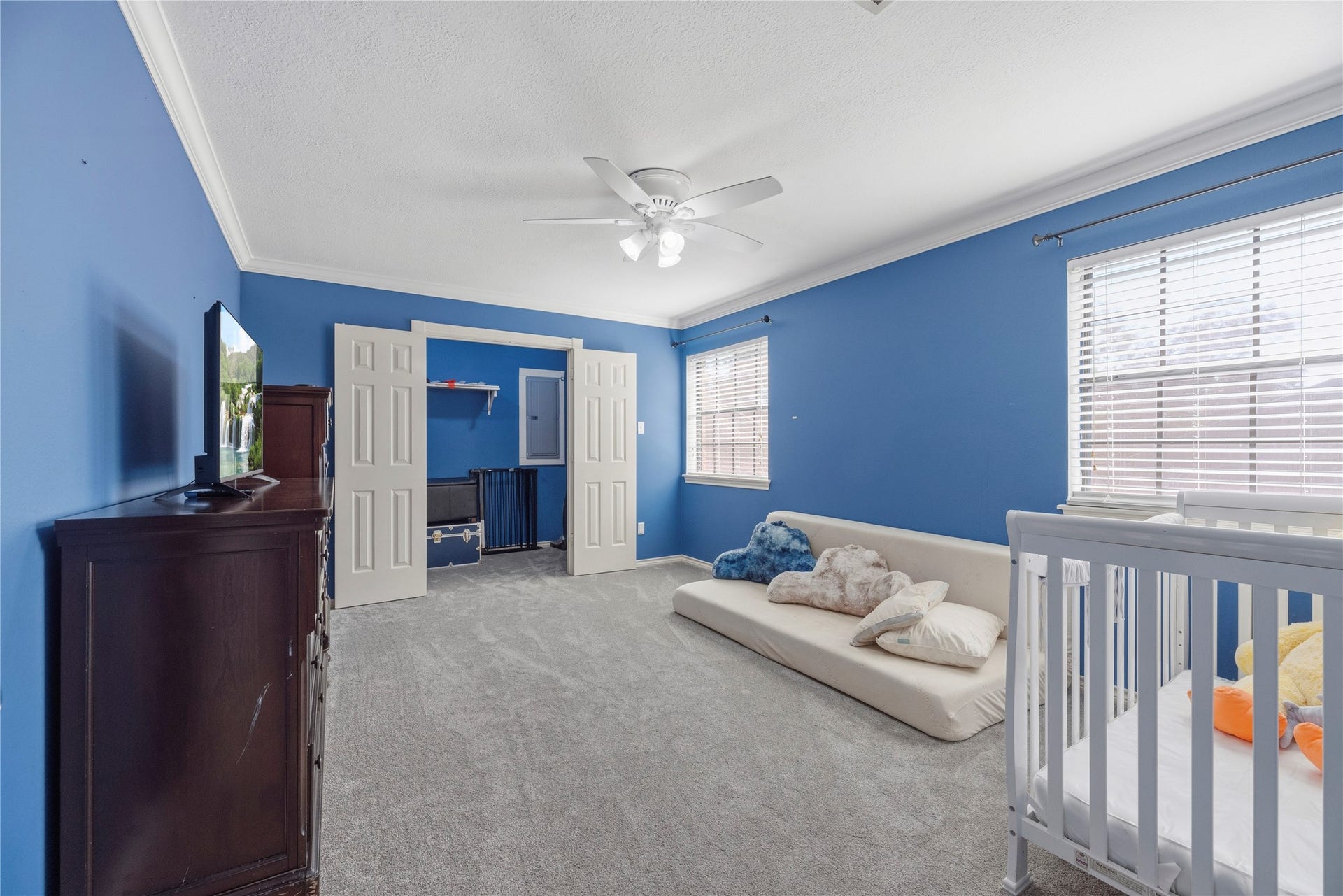 5823 Ashmere Lane, Spring, TX 77379 This spacious bedroom offers plenty of room to make it your own, with updated carpet, designer paint, crown molding and a ceiling fan for added comfort. A wide closet provides great storage, while a full bathroom just outside the door adds everyday convenience.