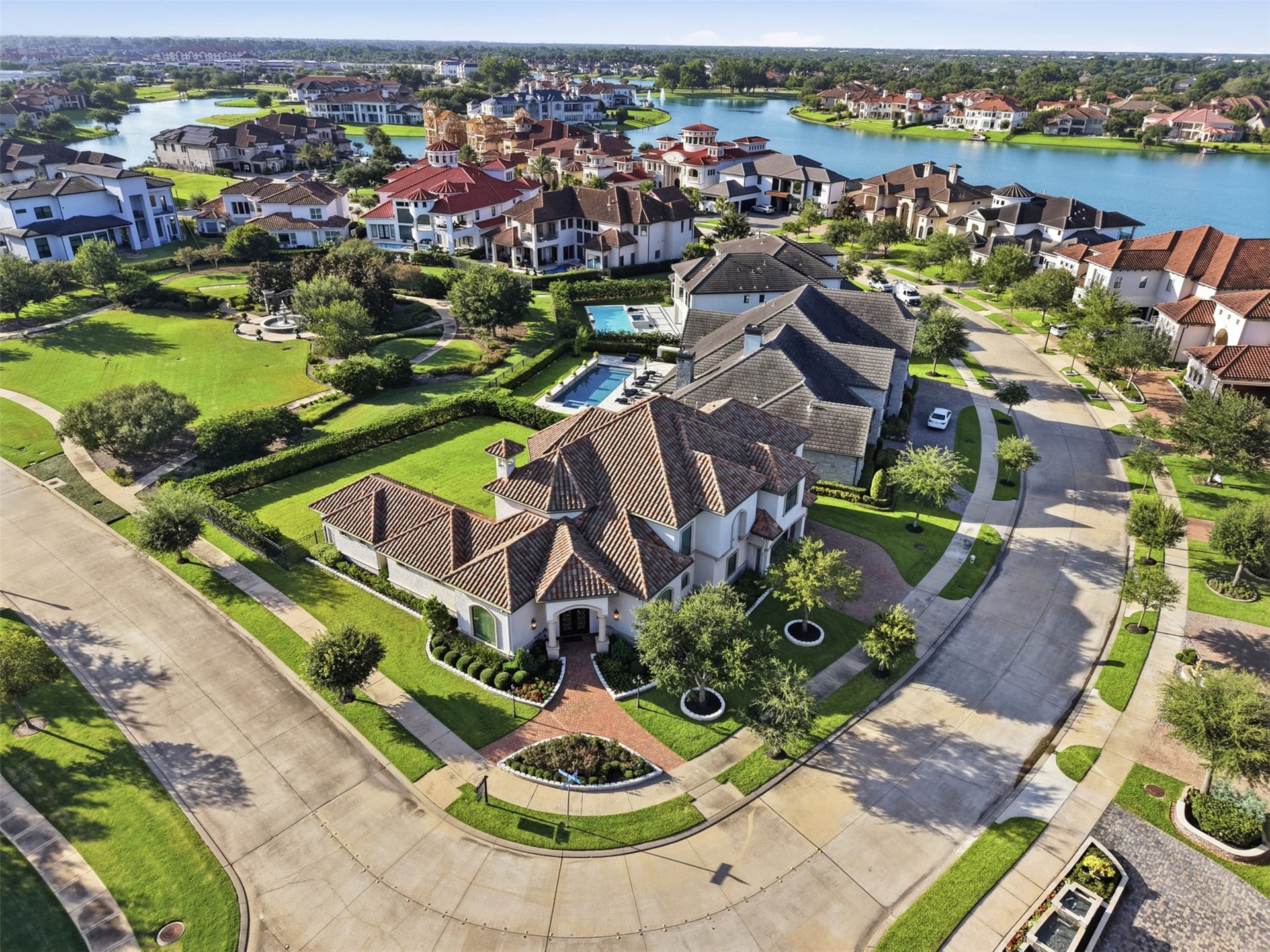 A stunning Mediterranean estate on a premier corner lot in Riverstone, offering timeless elegance, impressive curb appeal, and an exceptional luxury lifestyle.