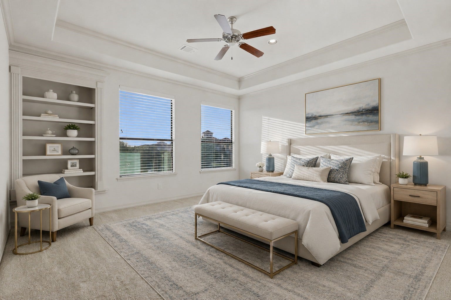 One of three upstairs bedrooms with plush carpeting, a tray ceiling, ceiling fan, large windows, and built-in shelving.**Virtually staged